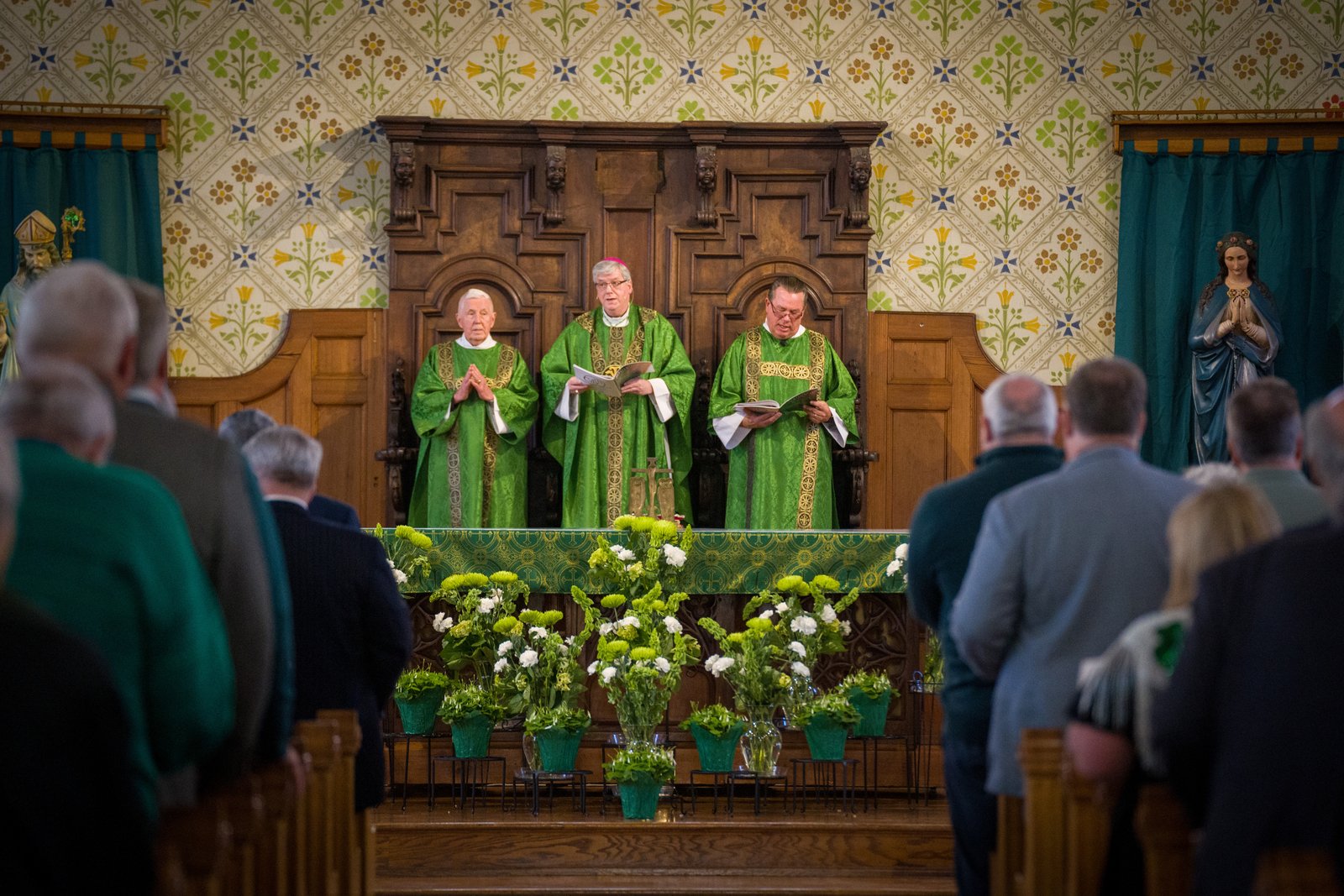 Auxiliary Bishop Gerard W. Battersby, whose ancestors hail from Belfast, Ireland, presides over the St. Patrick's Day Mass at Most Holy Trinity. The conversion of the Irish had a significant impact on the conversion of the rest of the world, Bishop Battersby said, as they emigrated to all corners of the globe, bringing the Gospel with them.