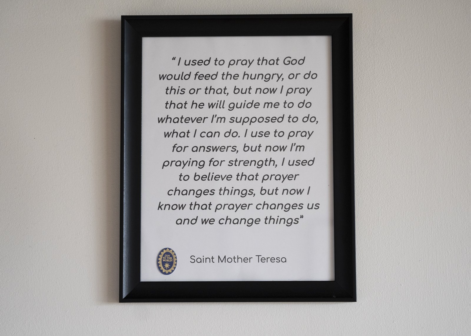 A quote from St. Teresa of Calcutta hangs on the wall of the Vella Group's office in Eastern Market. Vella says his faith in God is a driving factor of the work he does, but is quick to add it's not the only way to serve the Lord.