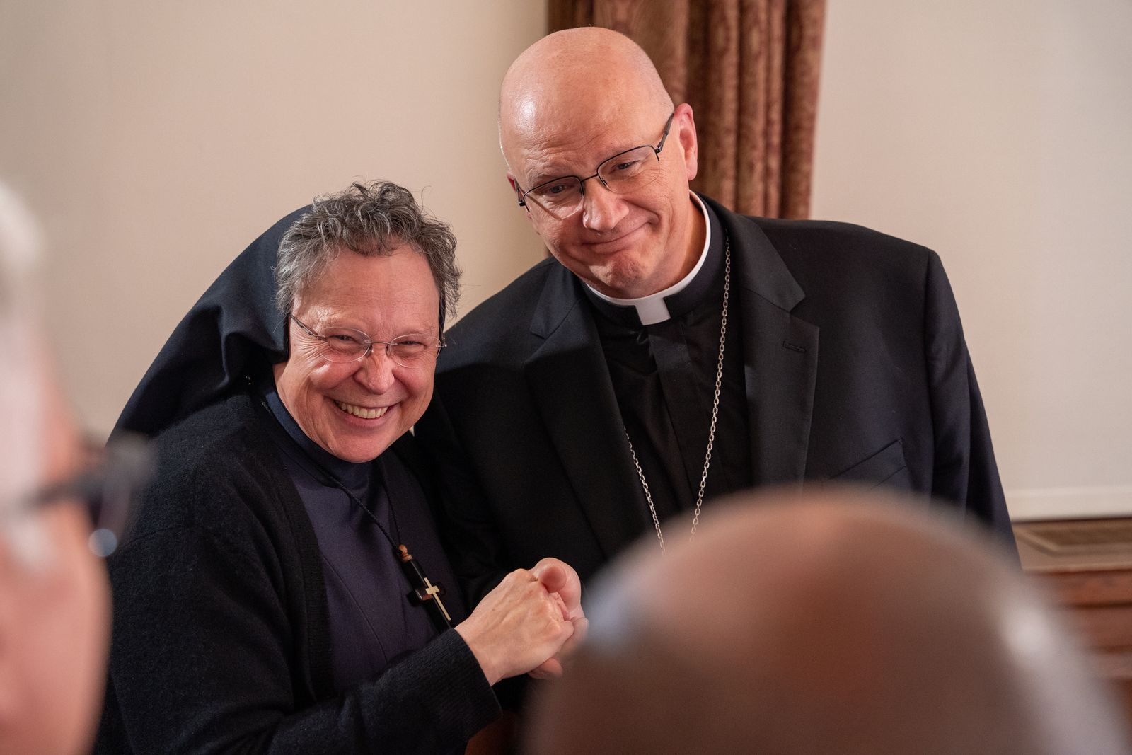 Archbishop-elect Weisenburger is greeted by Sr. Esther Mary Nickel, RSM, director of sacred worship for the Archdiocese of Detroit, after a morning news conference at Sacred Heart Major Seminary.