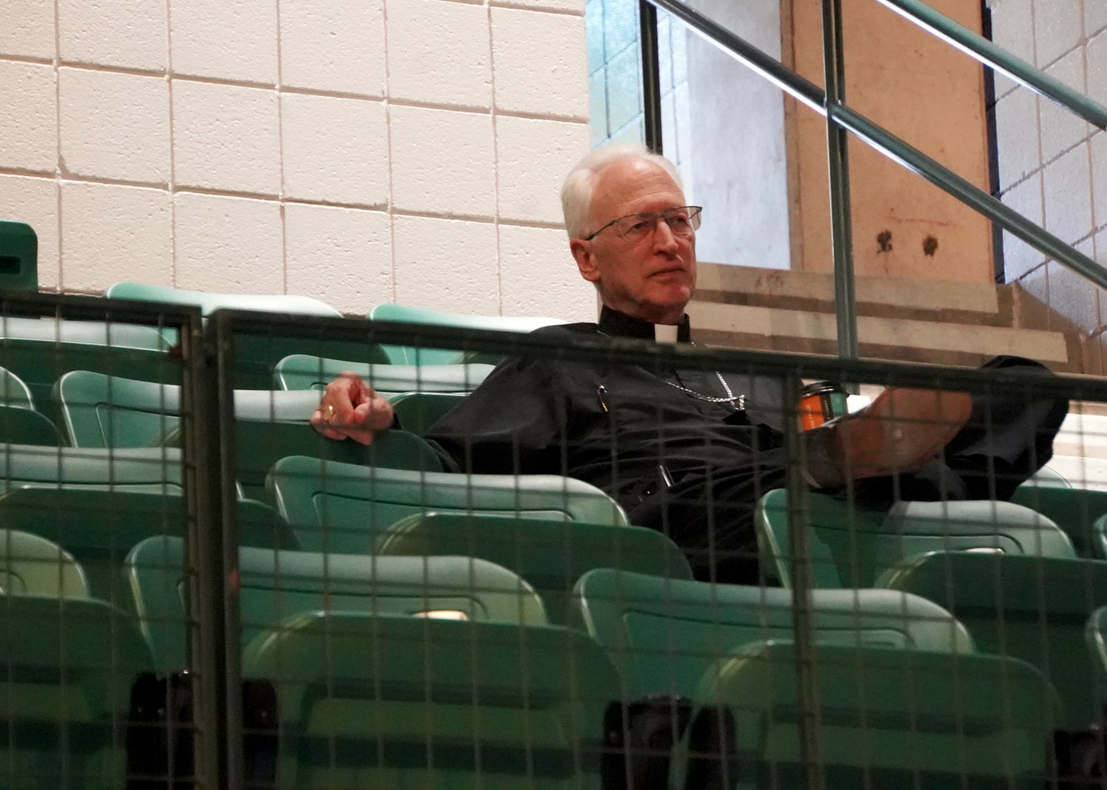 Bishop Boyea looked on as Jonathan Reyes spoke to the men about "mission" and the importance of brotherhood.