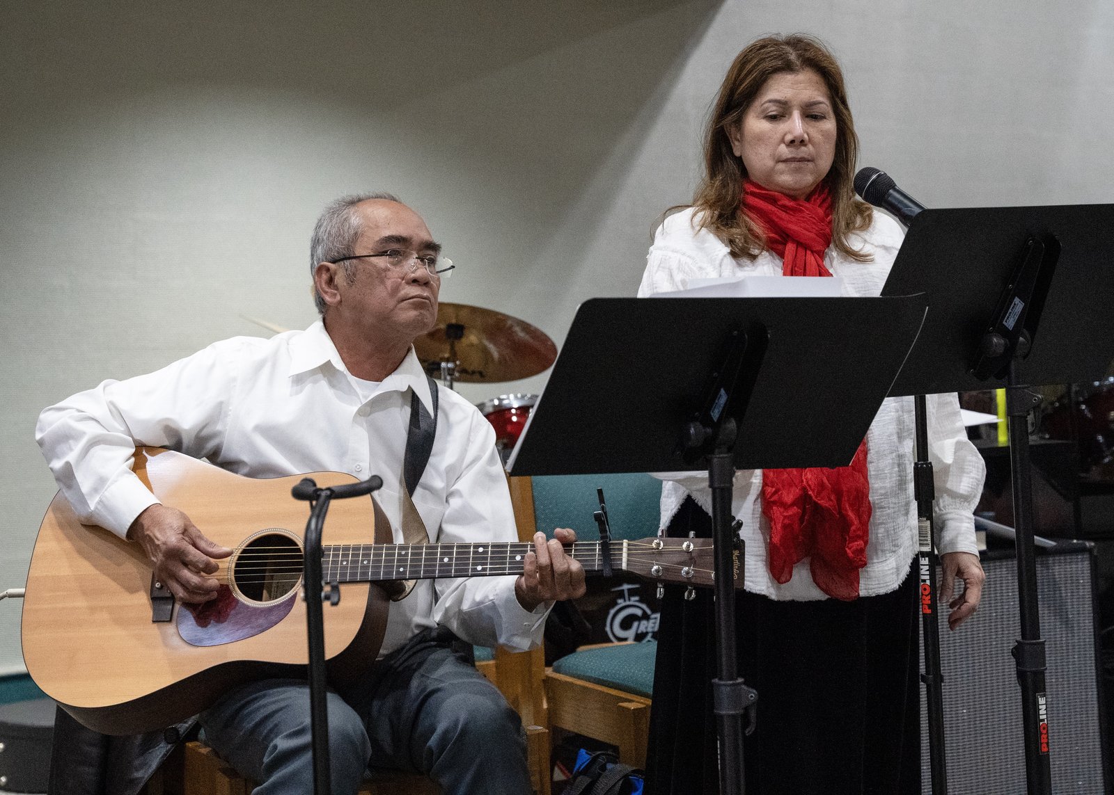 Musicians play Filipino hymns and Advent songs during the first night of Simbang Gabi at St. Mary, Cause of Our Joy.
