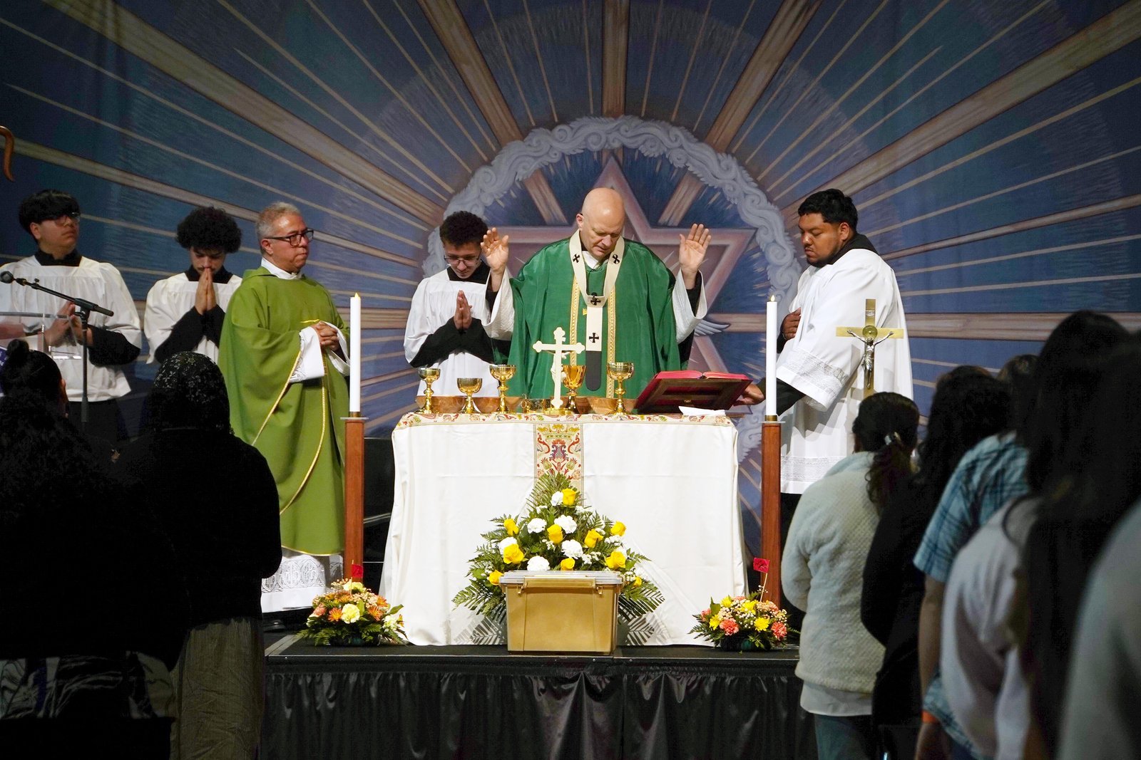 The Mass celebrated by Archbishop Edward J. Weisenburger was a central moment of the conference.