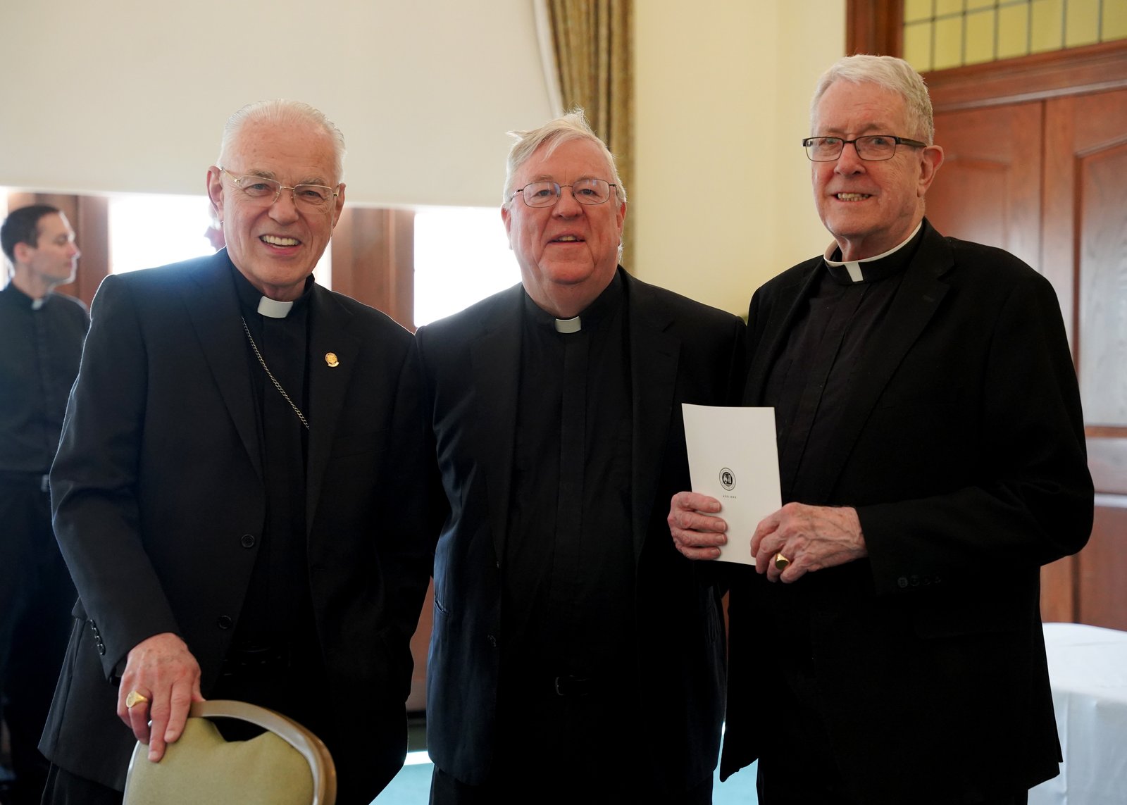 From left, retired Auxiliary Bishop Donald F. Hanchon, Msgr. Charles Kosanke and Fr. William Herman enjoy one another's company during a luncheon for jubilarian priests May 10 at Sacred Heart. Msgr. Kosanke is celebrating 40 years of priestly ministry, while Fr. Herman is celebrating 25 years. Bishop Hanchon was ordained 51 years ago.