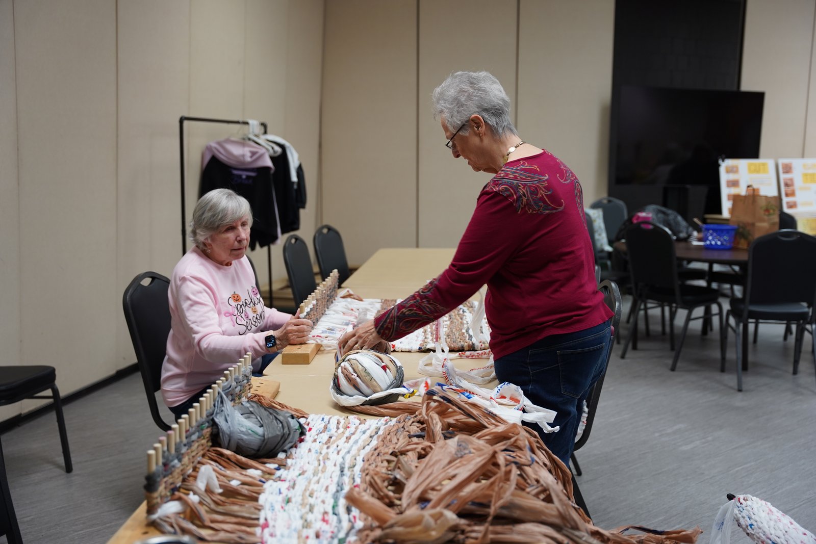 Once "plarn" is prepared, it's woven into mats and pillows using a special loom. St. Michael has used these looms to make and donate more than 80 mats and 20 pillows. (Maggie Sicilia | Detroit Catholic)