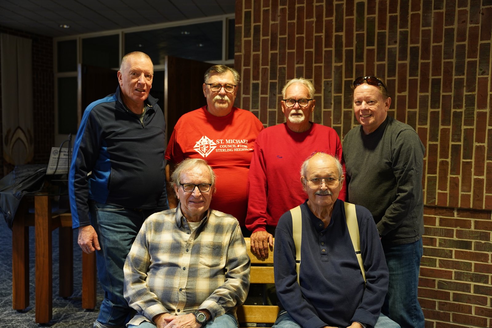 St. Michael's Knights of Columbus Council 13799 prepares benches in memory of deceased members. (Maggie Sicilia | Detroit Catholic)
