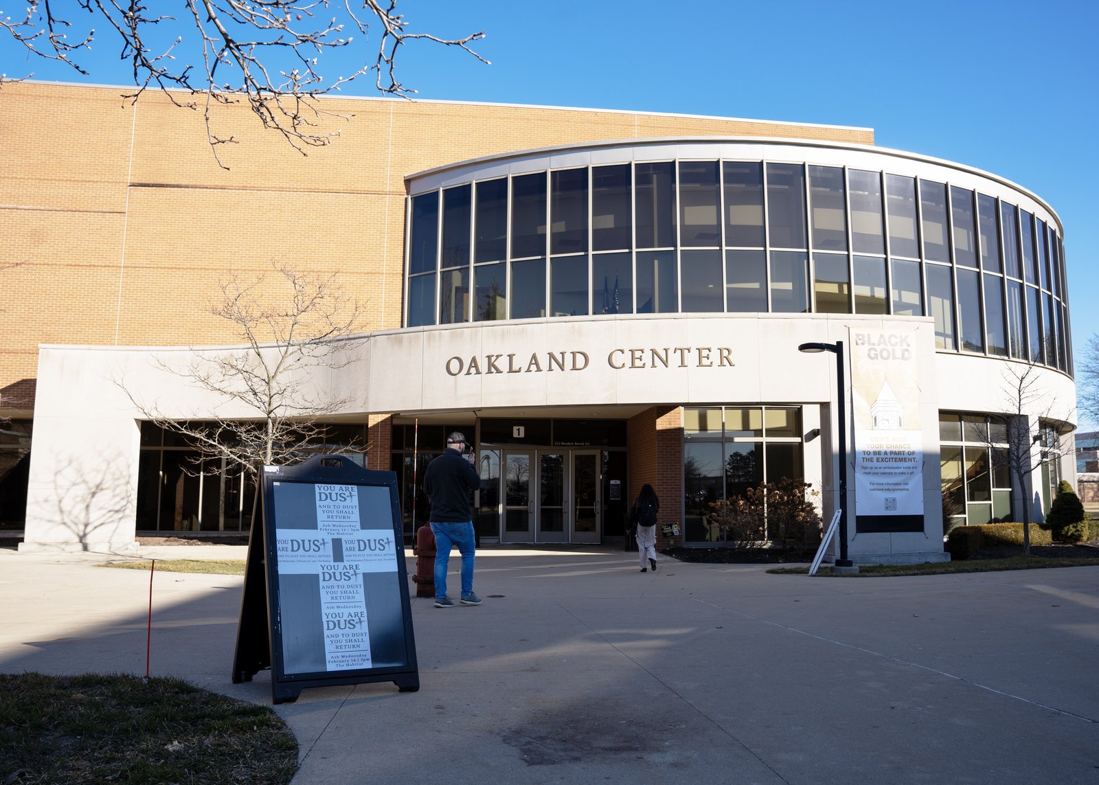 A sign outside Oakland University's student center invites people to receive ashes inside. Ashes serve as a reminder that God loved us so deeply that He offered His only son in order that we might be saved from sin and death, Fr. Mateja said.