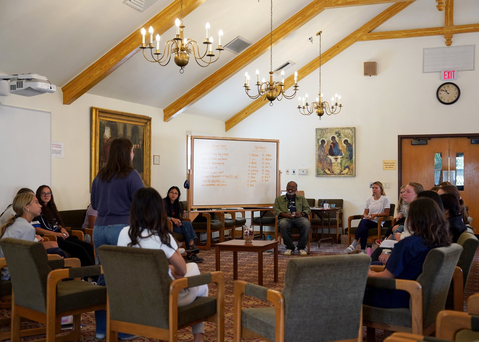 A group of young retreatants from the Academy of the Sacred Heart in Bloomfield Hills gather in one of the meeting spaces for their senior retreat.