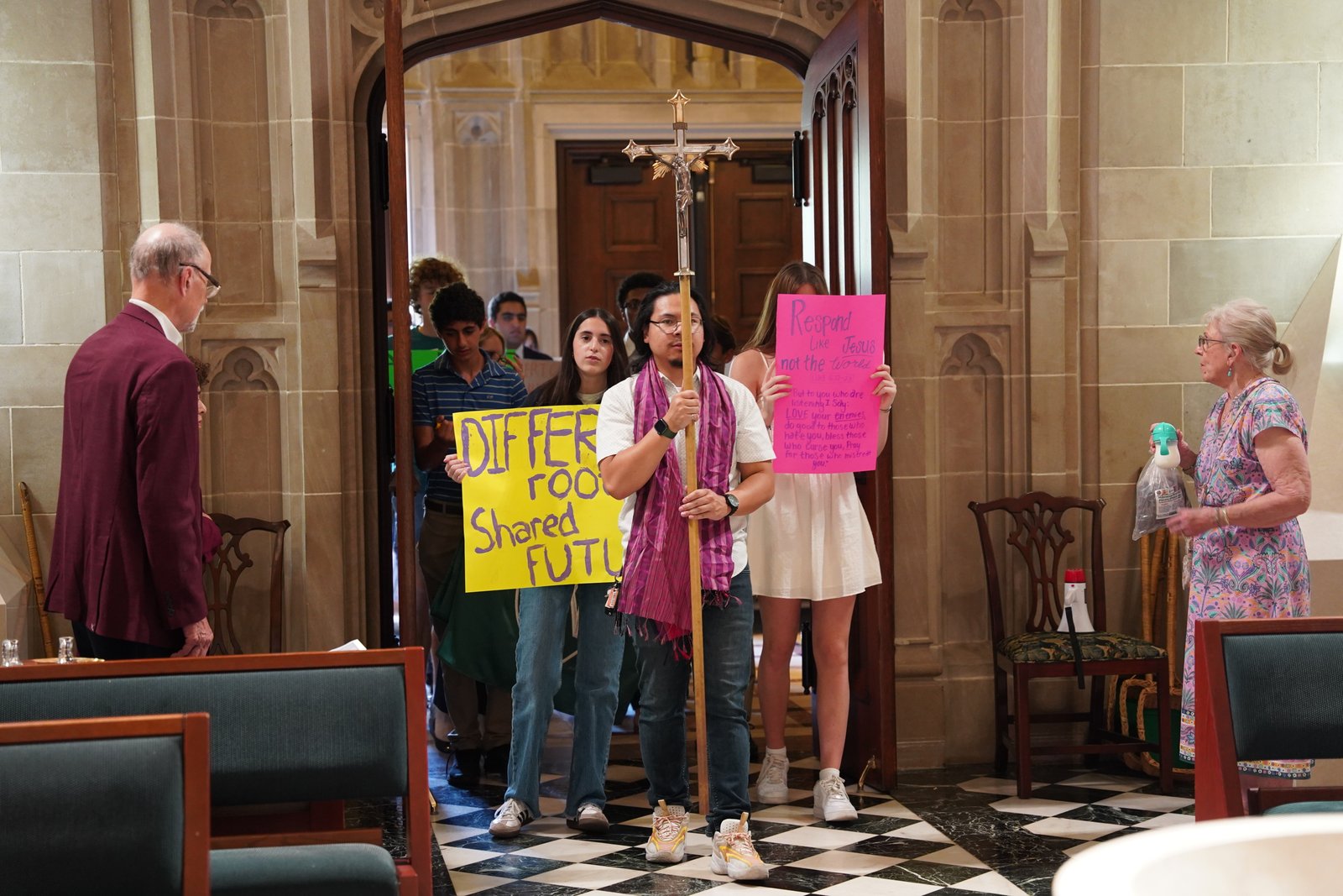 Members of Strangers No Longer process into the Cathedral of the Most Blessed Sacrament in Detroit on Oct. 5 during a Mass for the Jubilee of Migrants. (Photo by Daniel Meloy | Detroit Catholic)