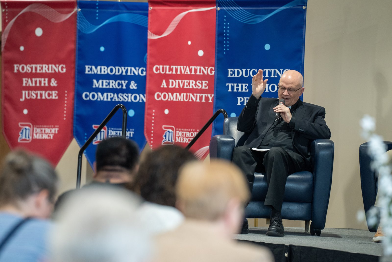 Detroit Archbishop Edward J. Weisenburger speaks during a panel discussion about the prophetic role of the Church in today's age. The archbishop noted the importance of authentic witness, citing St. Teresa of Calcutta as an example.