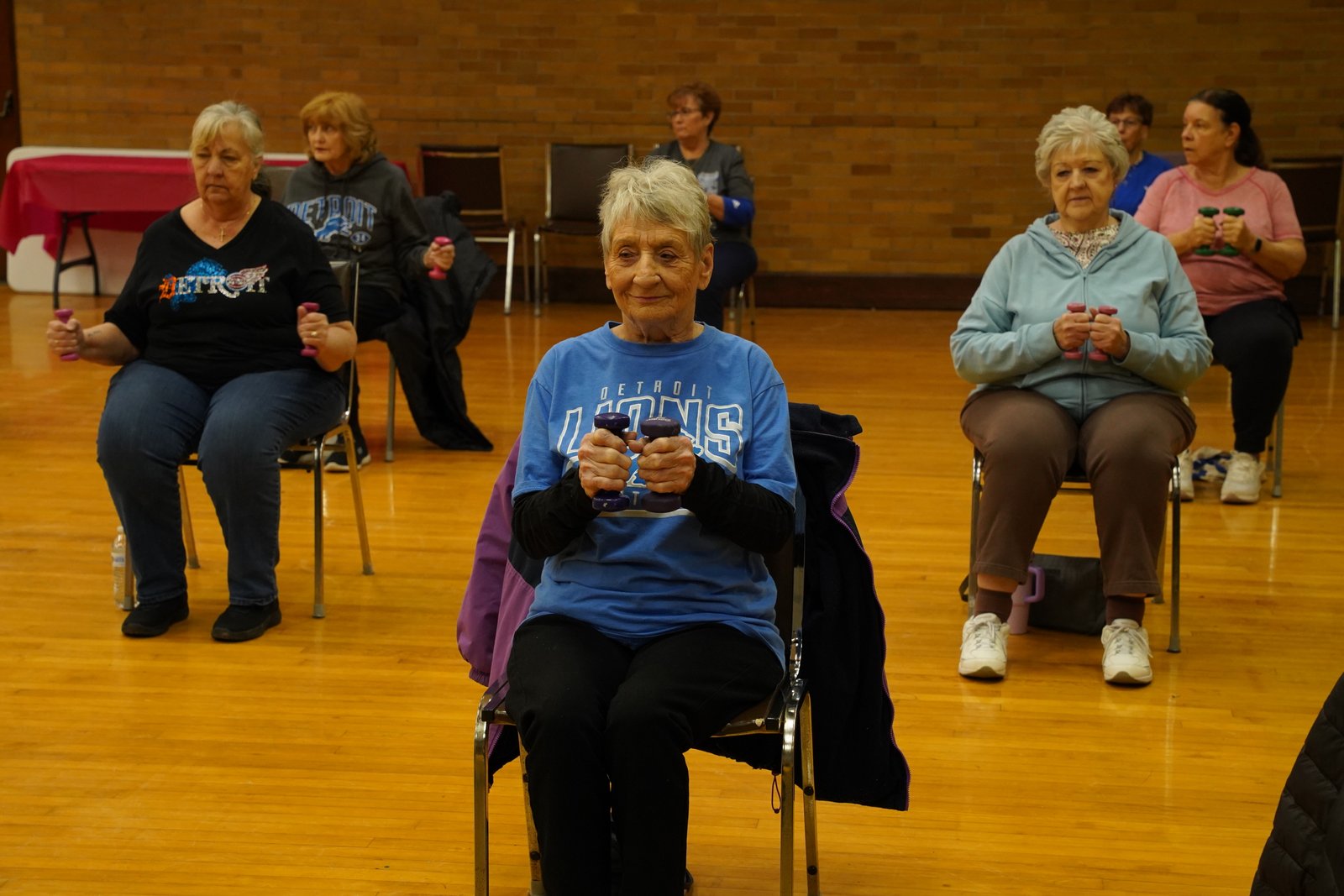The senior fitness classes include a variety of sitting and standing exercises that group members say helps them stay limber and mobile at home.
