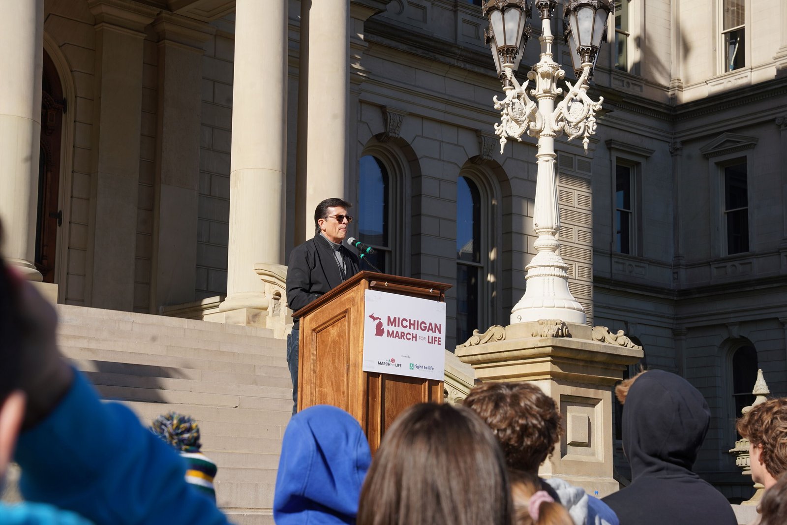 Former Detroit TV news personality Chuck Gaidica speaks from the steps of the state Capitol building in Lansing during the 2025 Michigan March for Life.