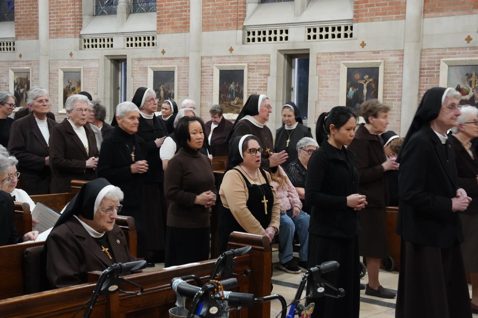 Felician Sisters line up to receive the Eucharist during a special Mass to conclude the congregation's 150th anniversary in North America on Nov. 21 at Presentation of the Blessed Virgin Mary Chapel in Livonia.