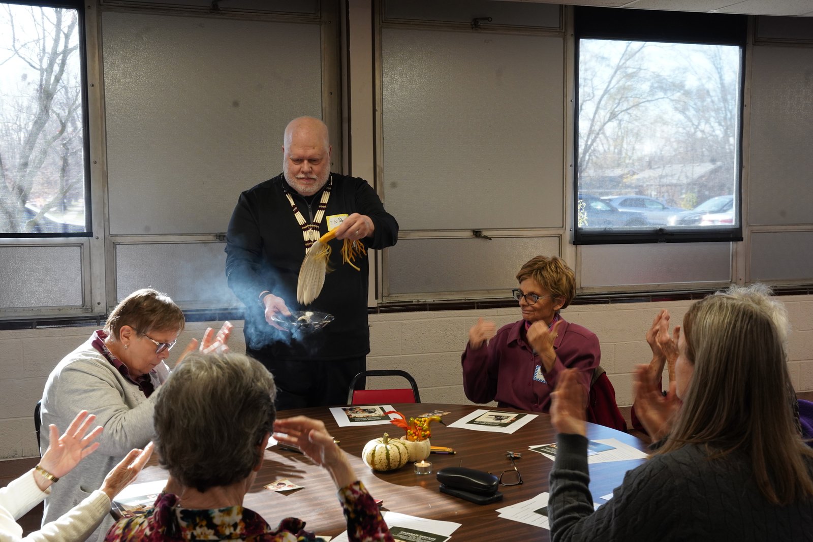 Deacon Morello burns incense as part of the smudging ceremony at the beginning of the Celebrate Heritage event at St. John XXIII Parish in Redford Township.