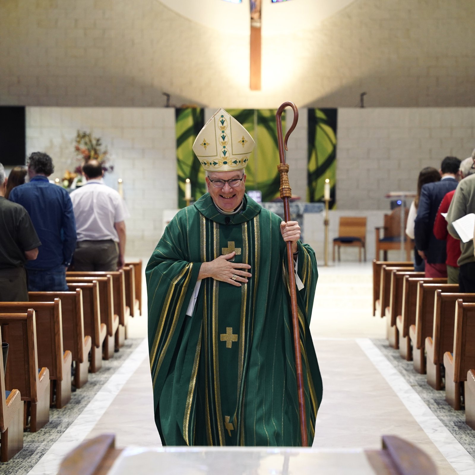 Detroit Auxiliary Bishop Jeffrey M. Monforton smiles at the conclusion of Mass on Oct. 11 at St. James Parish in Novi. During his homily, Bishop Monforton asked married couples to take inspiration from the Blessed Virgin Mary in trusting God's plan for their vocation.