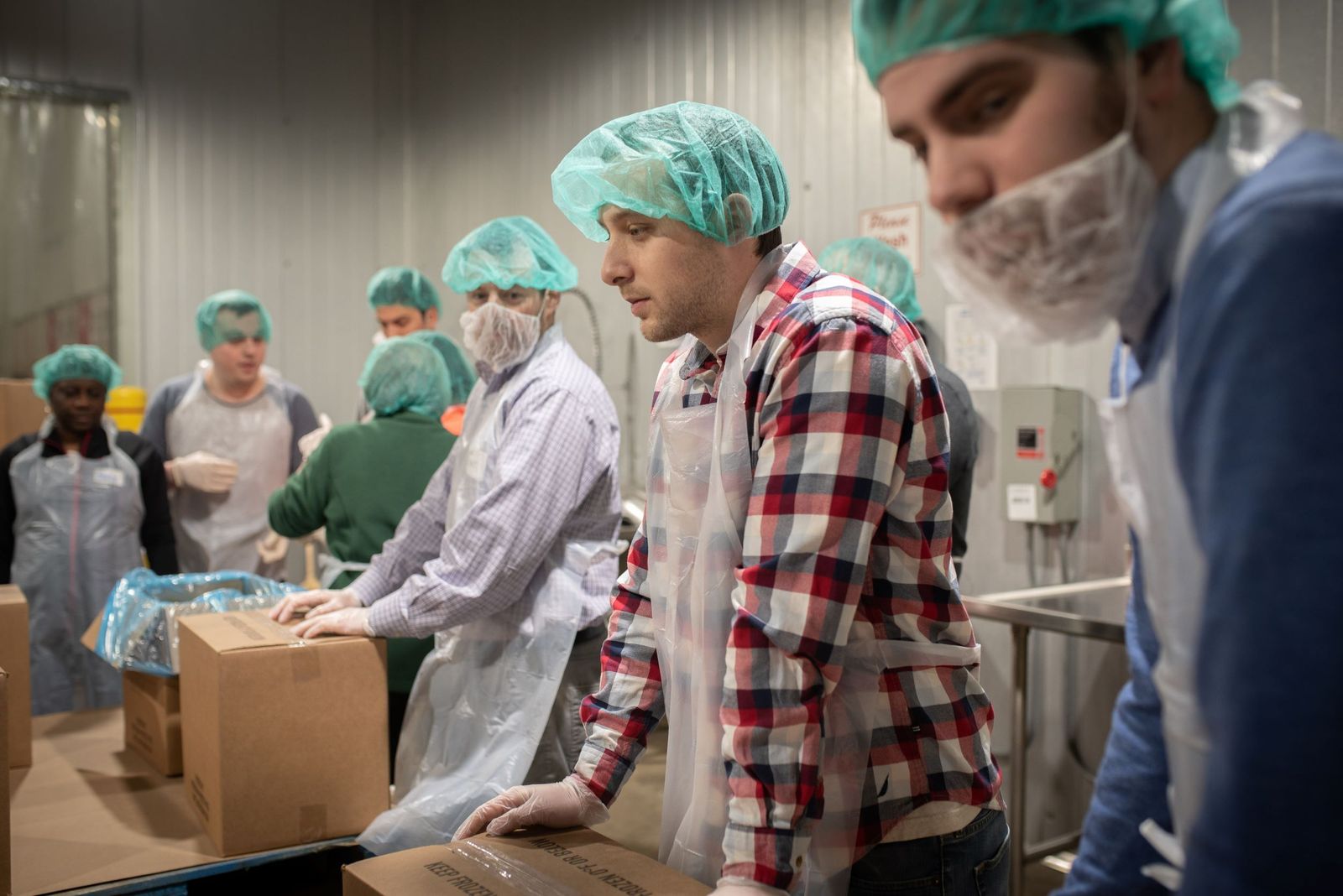 Large corporations and organizations, which prior to the pandemic routinely sent teams of volunteers to stock, package, transport and organize food at distribution sites such as Gleaners and Forgotten Harvest, pulled back because of safety concerns, leaving gaps that had to be filled by paid staff. While some volunteers are beginning to return, both organizations say it's one of their biggest current needs. (Valaurian Waller | Detroit Catholic)