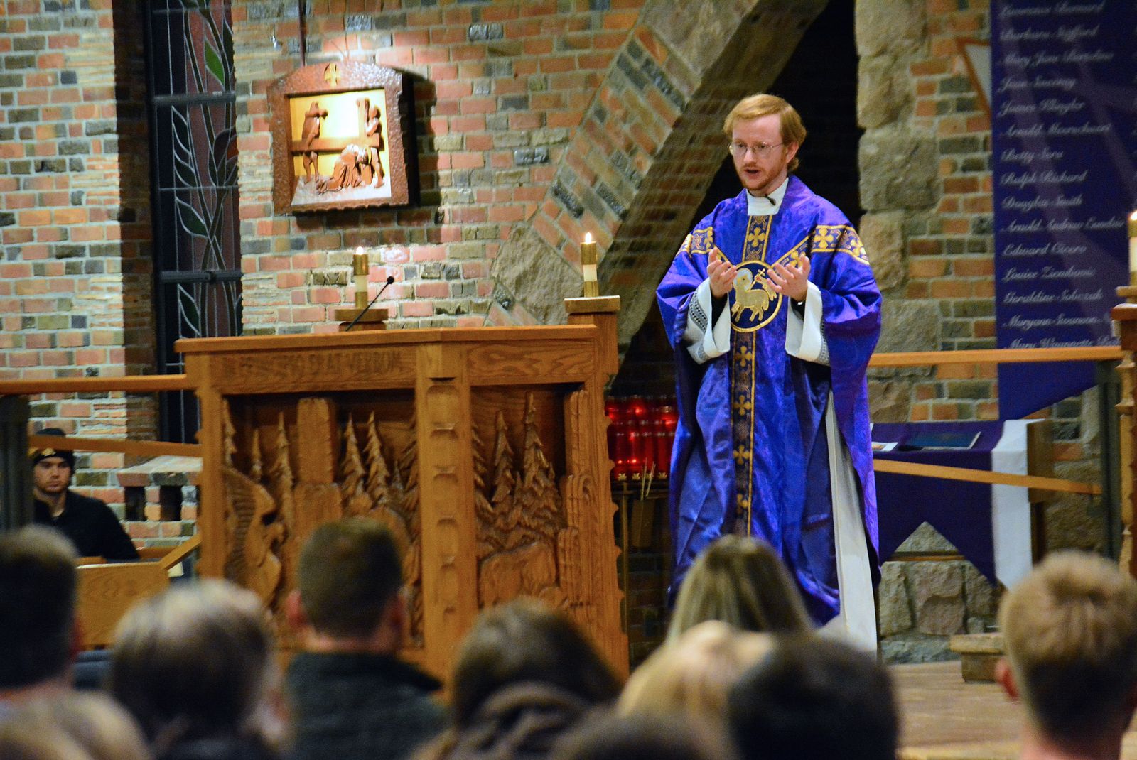St. Joseph associate pastor Fr. John Carlin consoled those present, telling them Jesus' victory on the Cross will conquer all sadness and suffering, despite the pain that exists now.