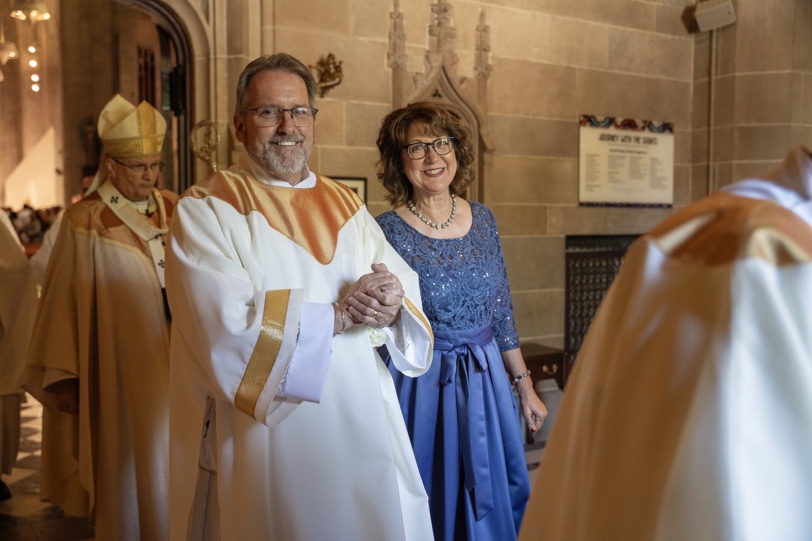 Deacon John Rybski and his wife Judy process out of the Cathedral.