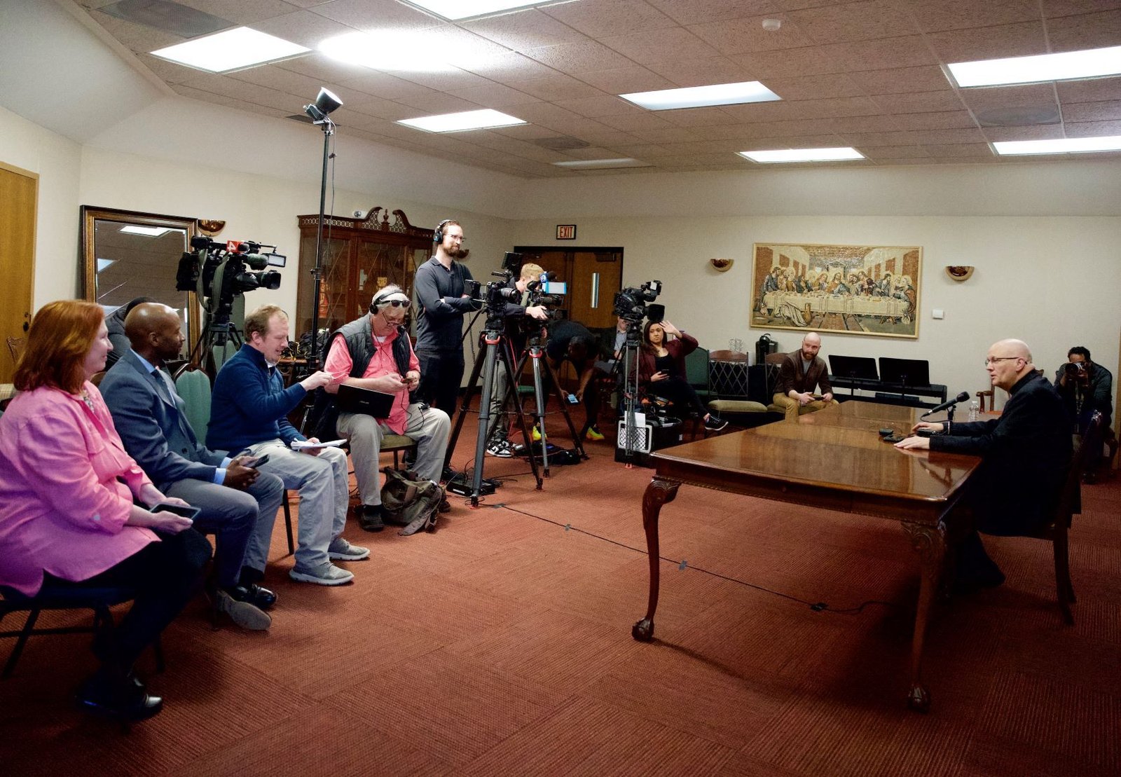 Archbishop Weisenburger addresses a room full of reporters and cameras May 8 at the Cathedral of the Most Blessed Sacrament following the election of Pope Leo XIV. (Izzy Cortese | Detroit Catholic)