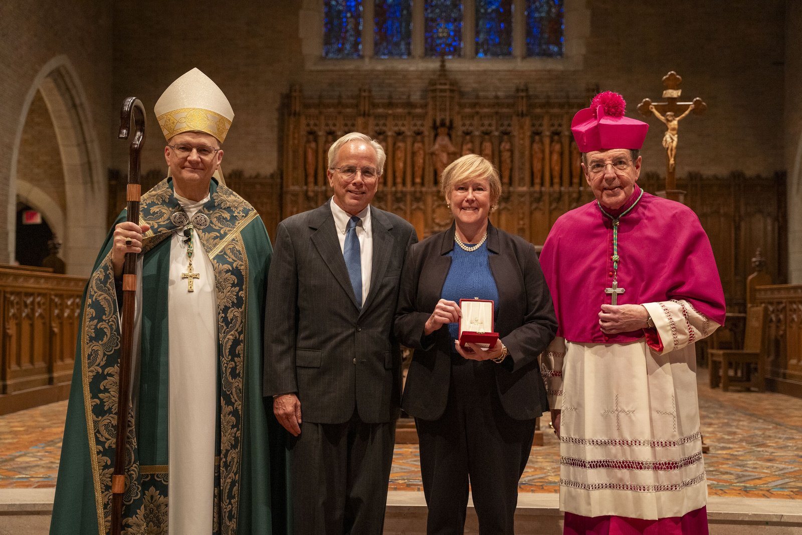Lory McGlinnen, second from right, is the director of parish care and Central Region coordinator for the Archdiocese of Detroit. McGlinnen previously serving various roles in the Church and is the executive director Ceciliaville.