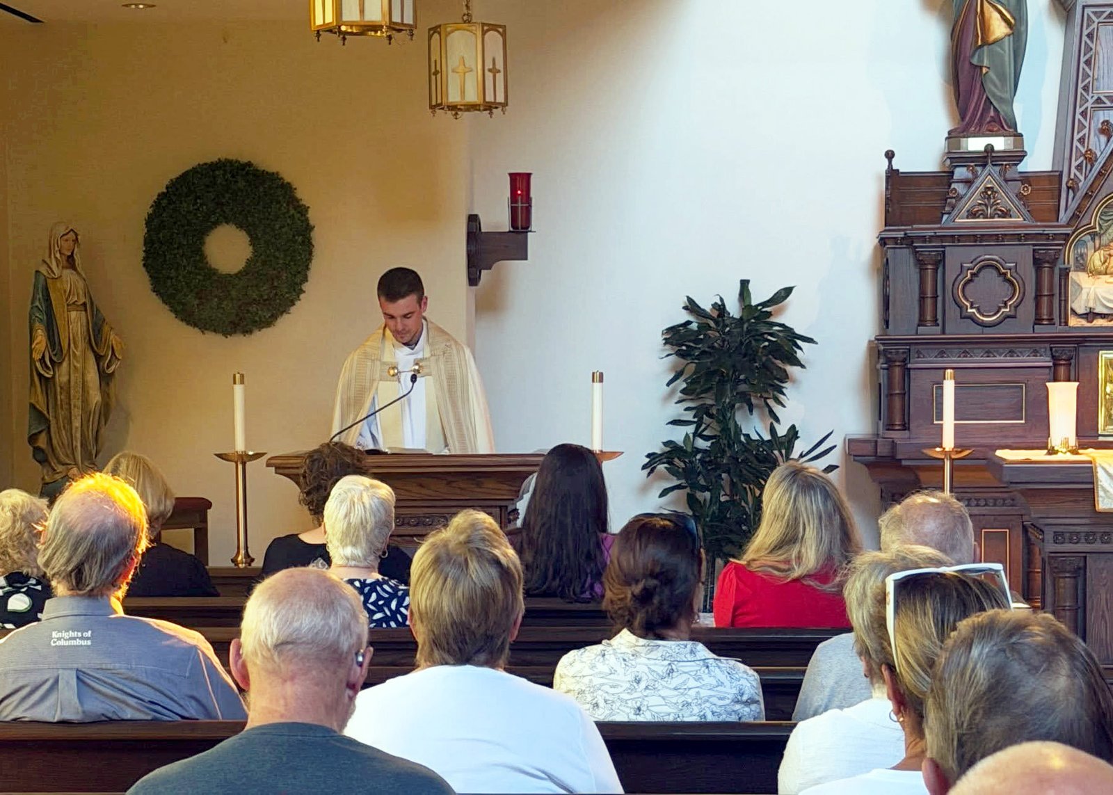 Fr. Finkbeiner celebrates Mass on July 30 at St. Regis Parish in Bloomfield Hills, part of the West Maple Family of Parishes along with Holy Name Parish in Birmingham, where Fr. Finkbeiner primarily serves. (Photo via St. Regis Parish's Facebook page)