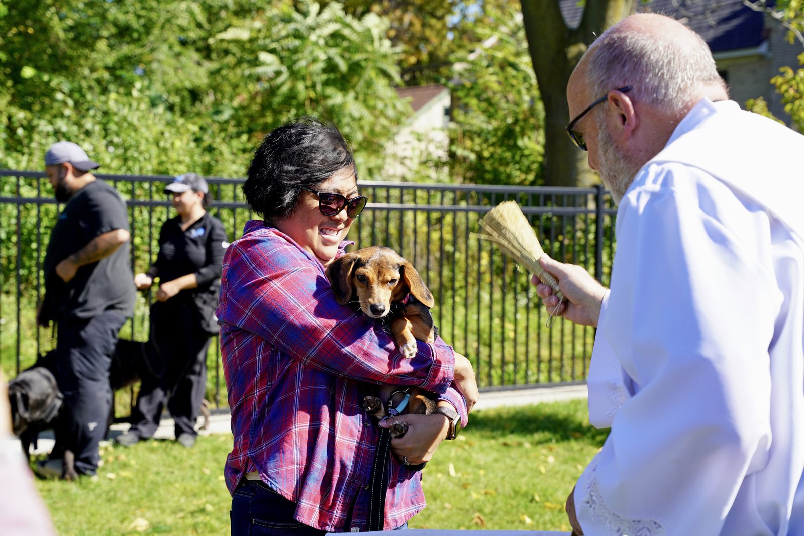 Deacon Jaskowiec welcomed guests to the dog park and reflected on the beauty of bringing God’s creatures together.