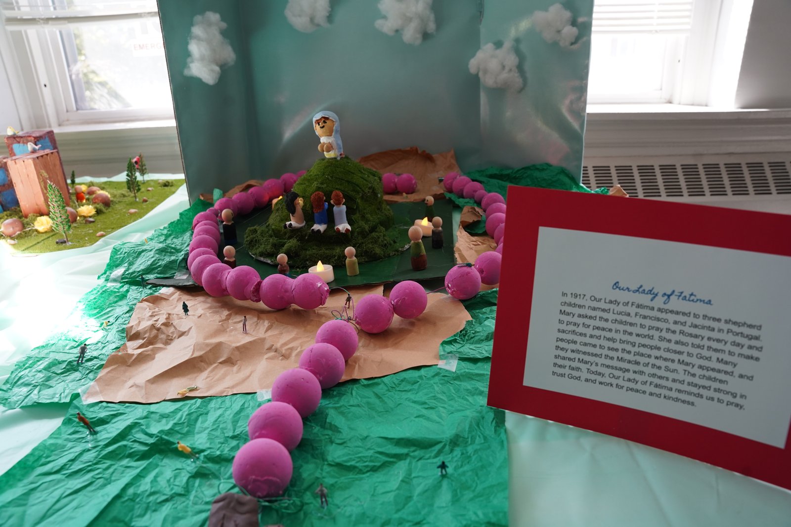 A 3D model depicting Our Lady of Fatima. Sixth- and Seventh-graders at Holy Redeemer School planned and 3D depictions of Marian apparitions throughout the world.
