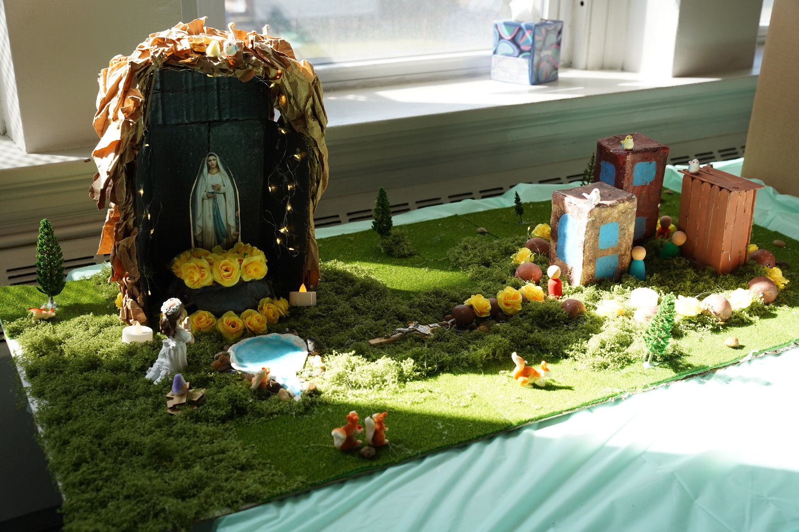 Sixth-grader Maria Belen and her team worked on a display spotlighting Our Lady of Lourdes, wanting to depict the natural elements present in Our Lady's apparition in Lourdes, France.