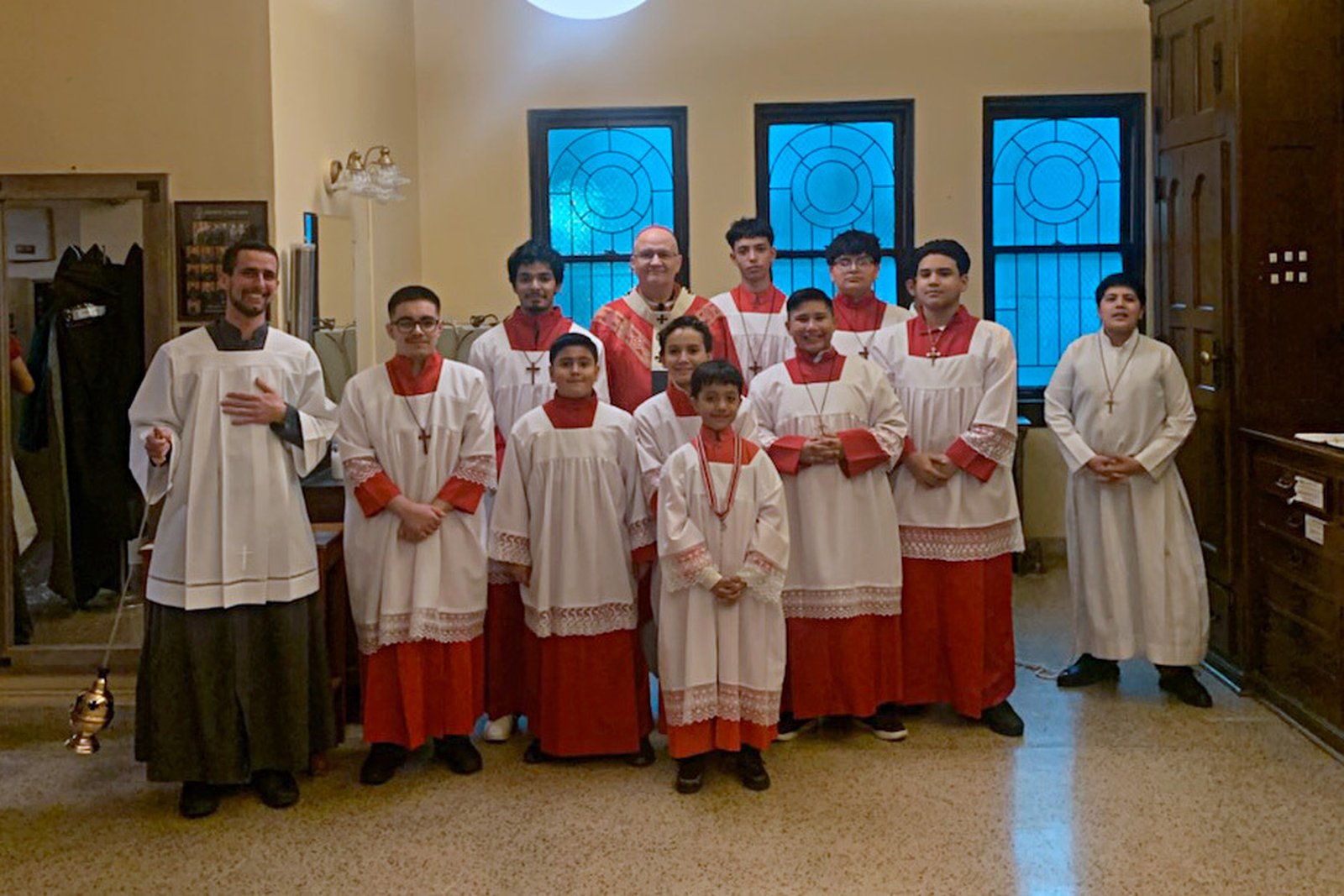 Archbishop Weisenburger takes a group photo with the altar servers at Most Holy Redeemer Parish before the Mass celebrating the feast of St. José Sánchez del Río. (Courtesy of Archbishop Weisenburger)