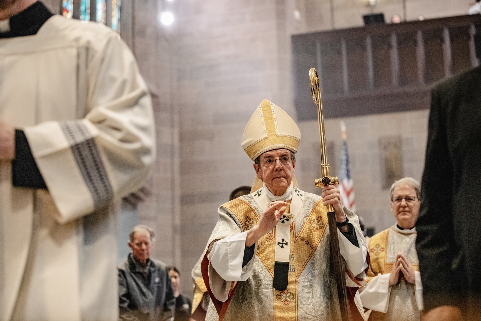 Archbishop Allen H. Vigneron blesses the faithful as he processes into the Cathedral of the Most Blessed Sacrament during the Solemnity of the Most Holy Body and Blood of Christ (Corpus Christi) on June 11. (Alissa Tuttle | Special to Detroit Catholic)
