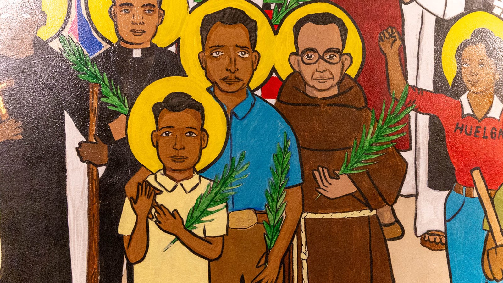 The individuals pictured on the mural represent the diversity of the southwest Detroit community.