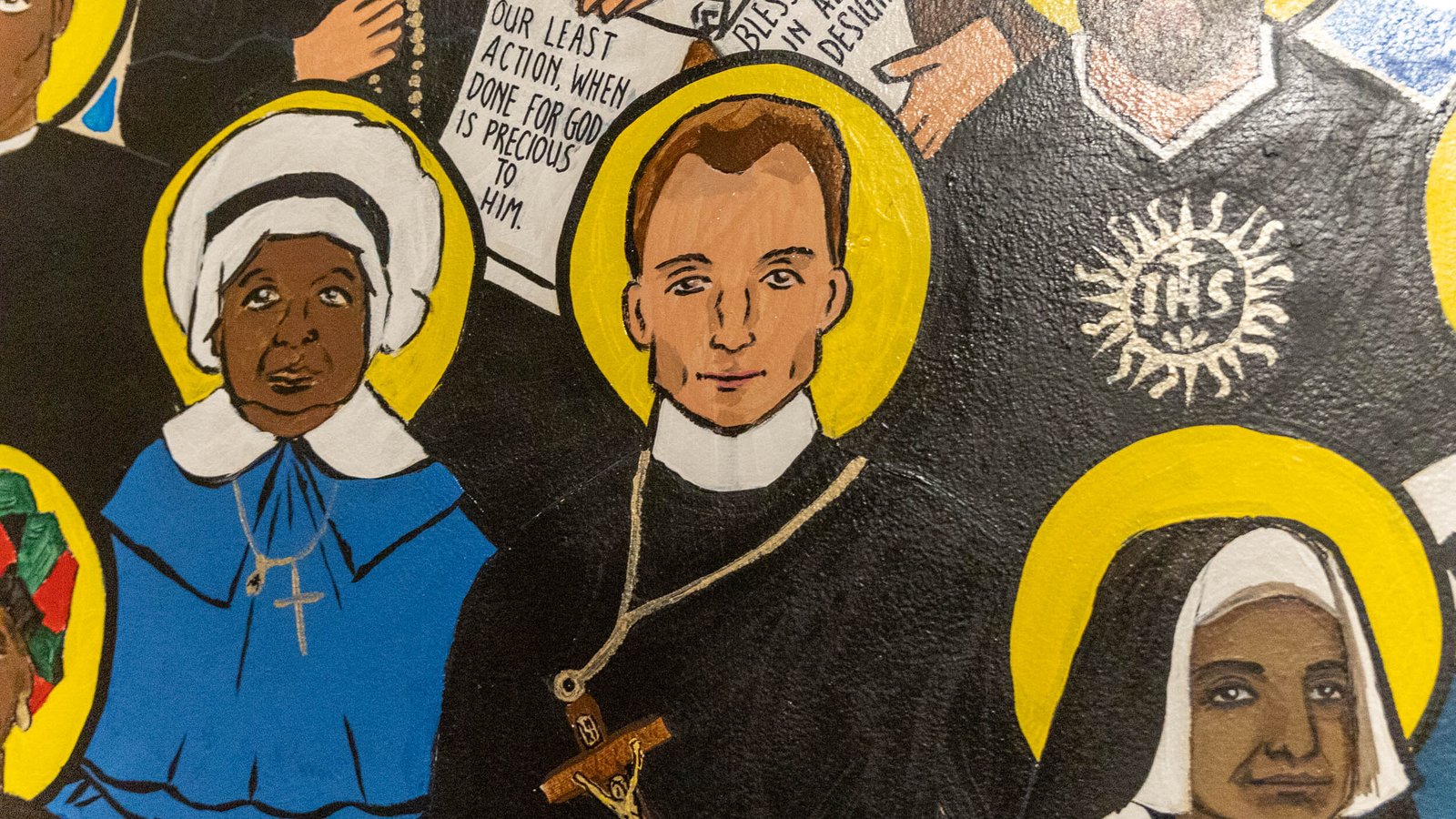 The individuals pictured on the mural represent the diversity of the southwest Detroit community.