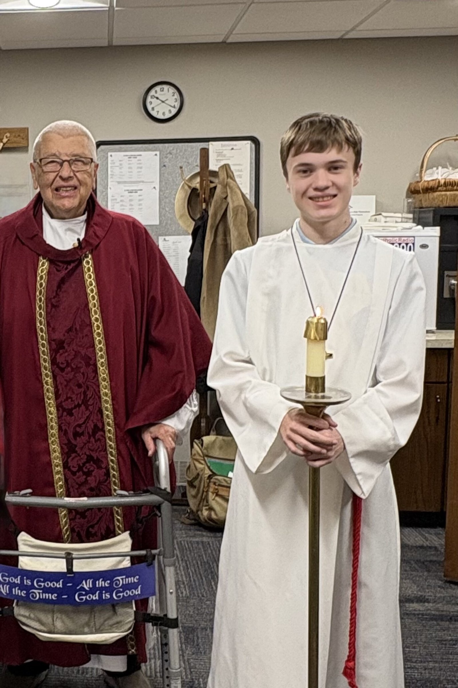 Christopher Gorgon, 14, is pictured serving Mass during Fr. Treml's retirement Mass last year. (Courtesy of DaNeil Gorgon)