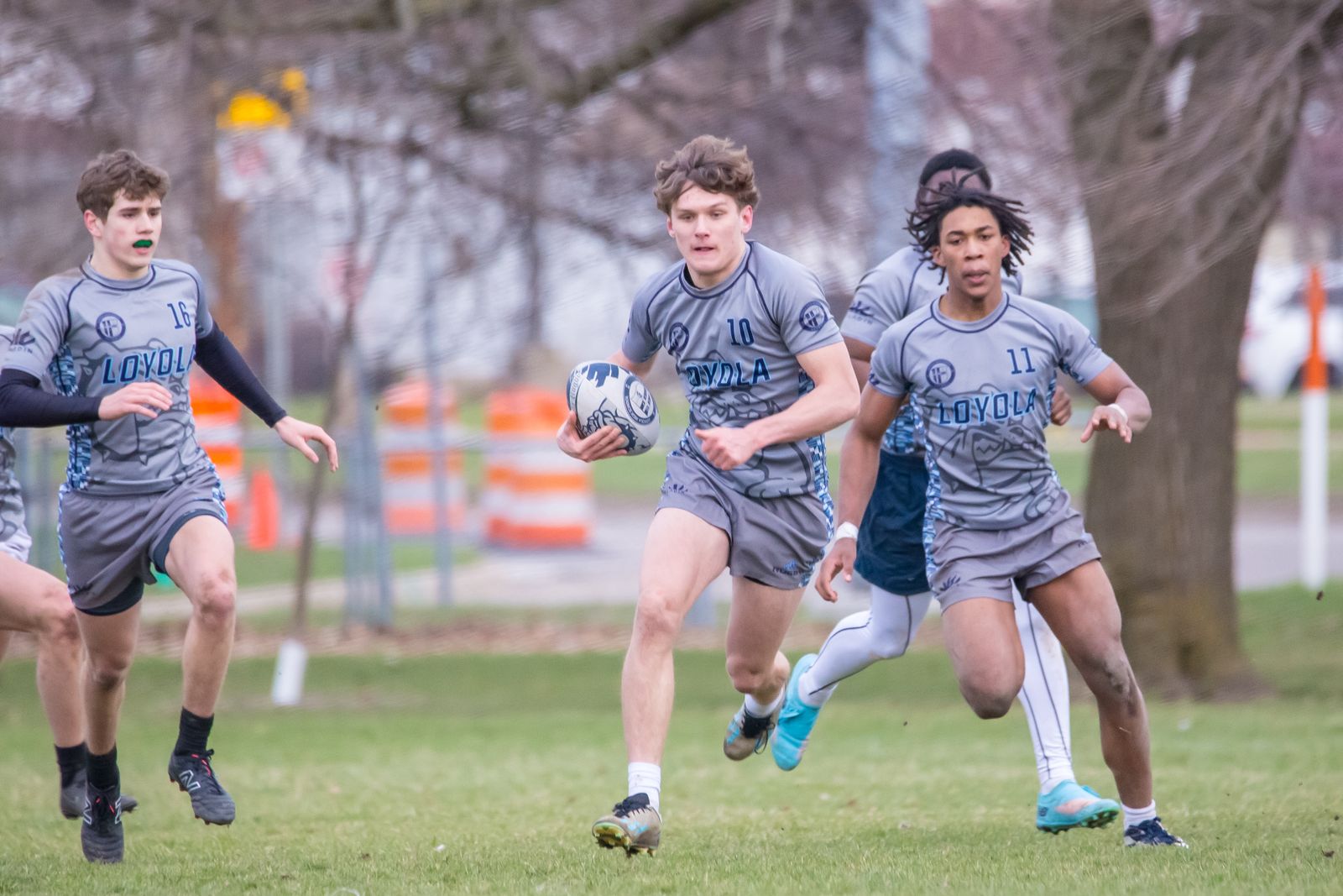 The Loyola rugby club attracts students from other schools as well, including Mason Maczuga from Madison Heights Lamphere (10), Collin Cole of Oak Park (11) and Ian Laskowski of Howell (16). (Photo by Kevin Roberts | Special to Detroit Catholic)