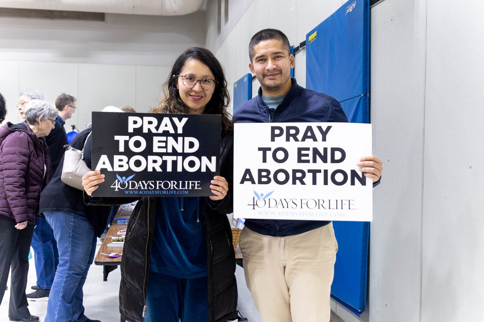 Volunteers hold signs used during the peaceful prayer vigil as part of the 40 Days for Life campaign in Ferndale. Volunteers can sign up for timeslots to participate in prayerful, silent witness.
