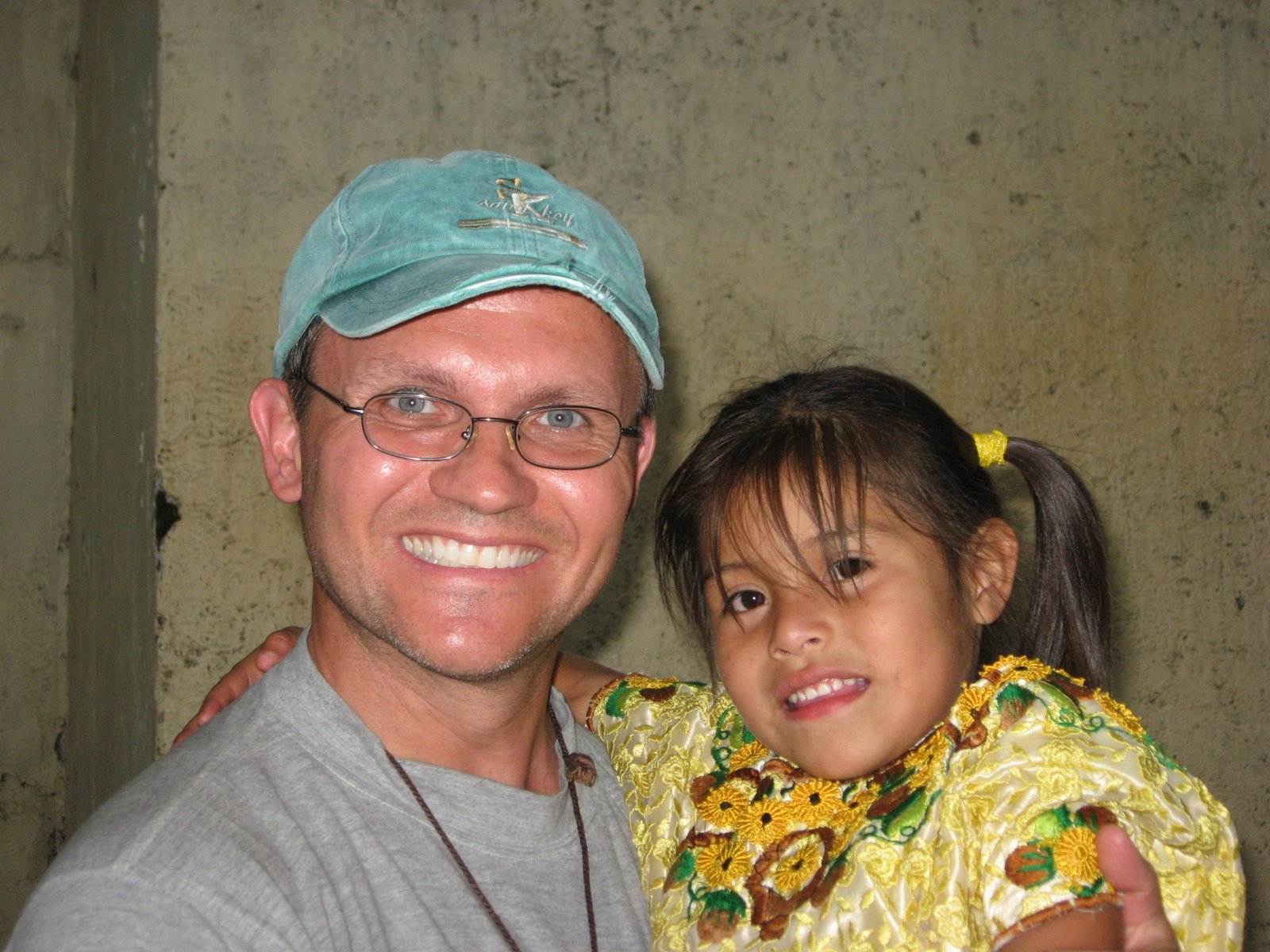 Tim Maag with a child in San Lucas Tolimán. Maag retired at the end of June after 27 years in campus ministry and the theology department at St. Mary Catholic Central High School in Monroe. Over the years, he led 23 mission trips and 348 students to Guatemala.
