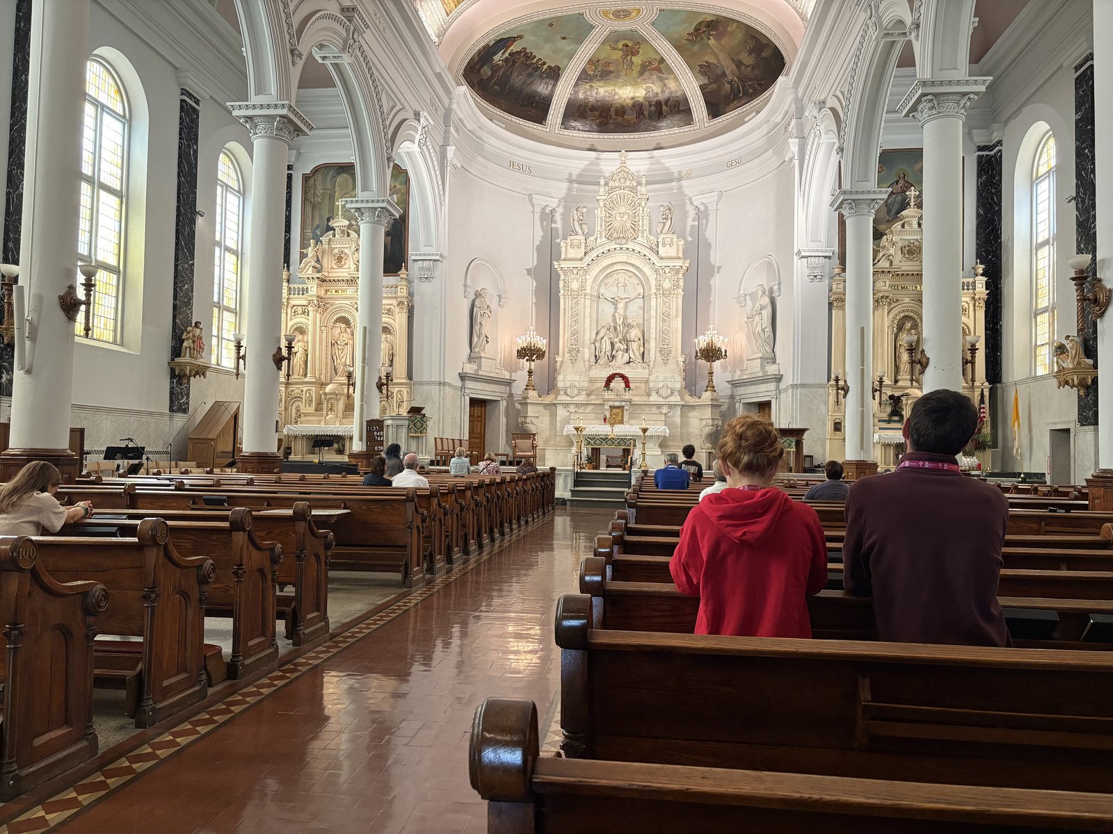 Catholics worship Jesus in the Blessed Sacrament during benediction at SS. Peter and Paul (Jesuit) Parish down the street from the revival. (Michael Stechschulte | Detroit Catholic)