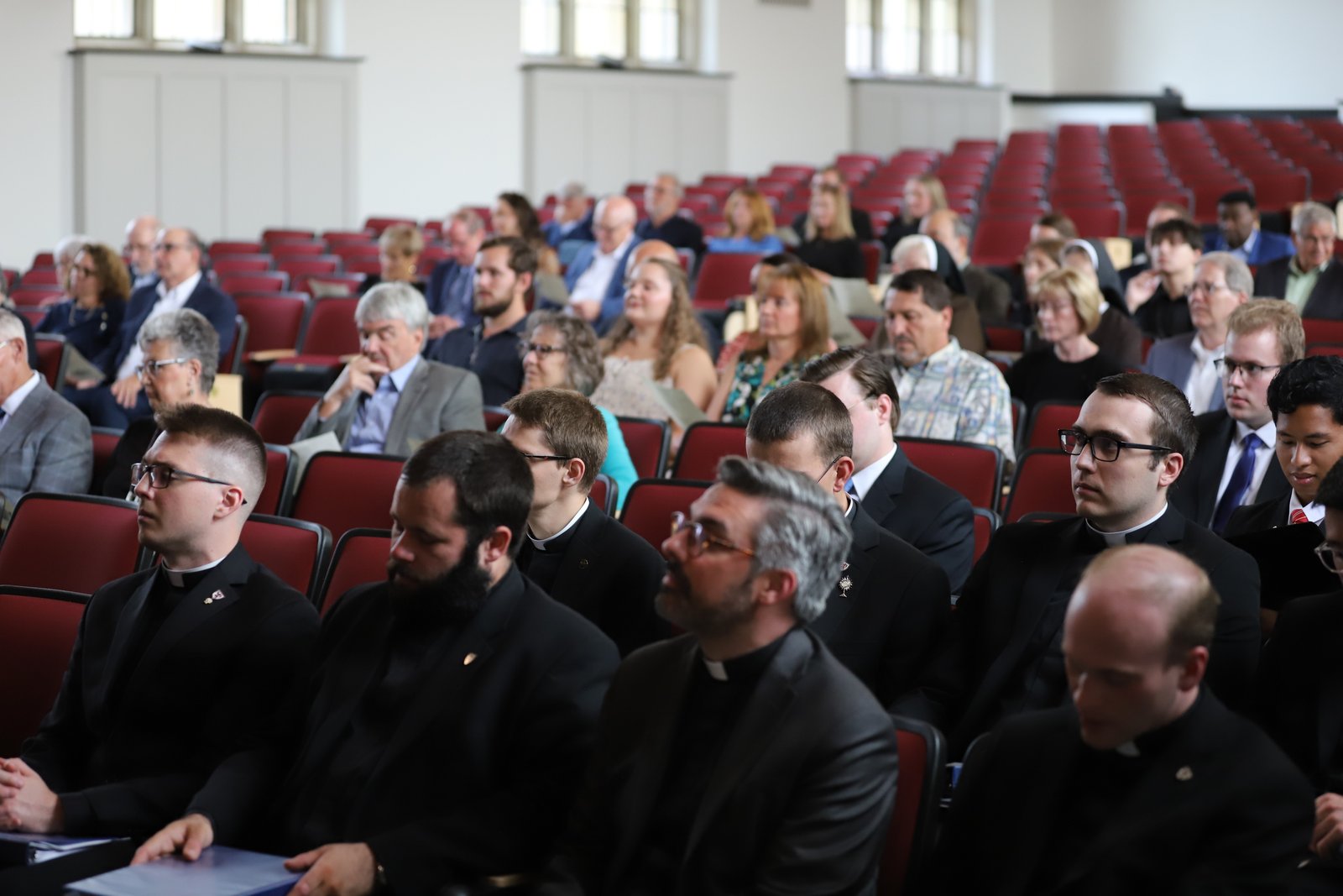 Members of the Sacred Heart Major Seminary community gather in the newly renovated auditorium Sept. 20 during a blessing and rededication, followed by a strolling dinner and reception.