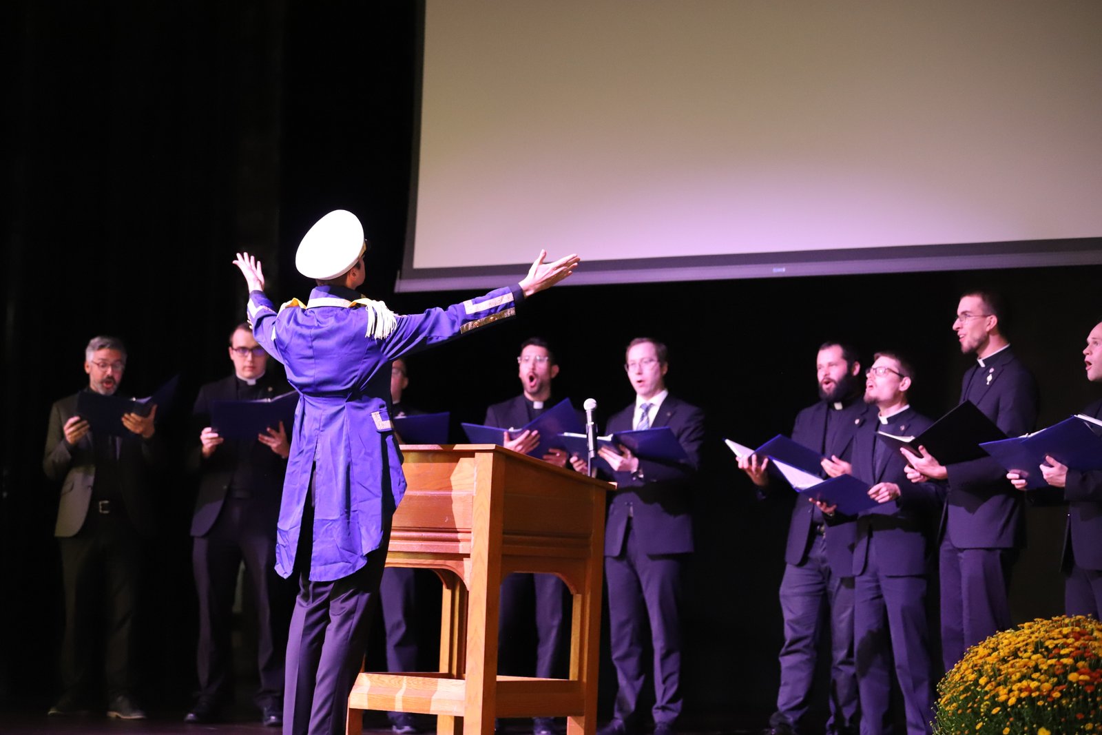 Cast members from last spring’s Sacred Heart musical, H.M.S. Pinafore, treated guests to a musical selection from the show.
