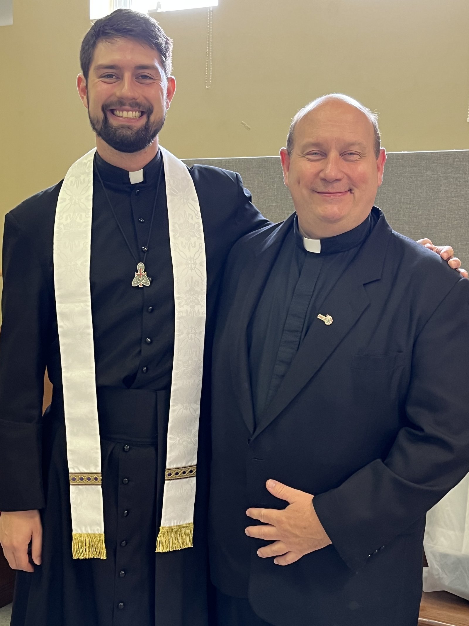 Fr. Walter Ptak, right, is pictured at Fr. Isaac Longworth's ordination in Ottawa in 2023. The photo was taken immediately after Fr. Ptak received a first blessing from the newly ordained Fr. Longworth. (Courtesy of Fr. Walter Ptak)