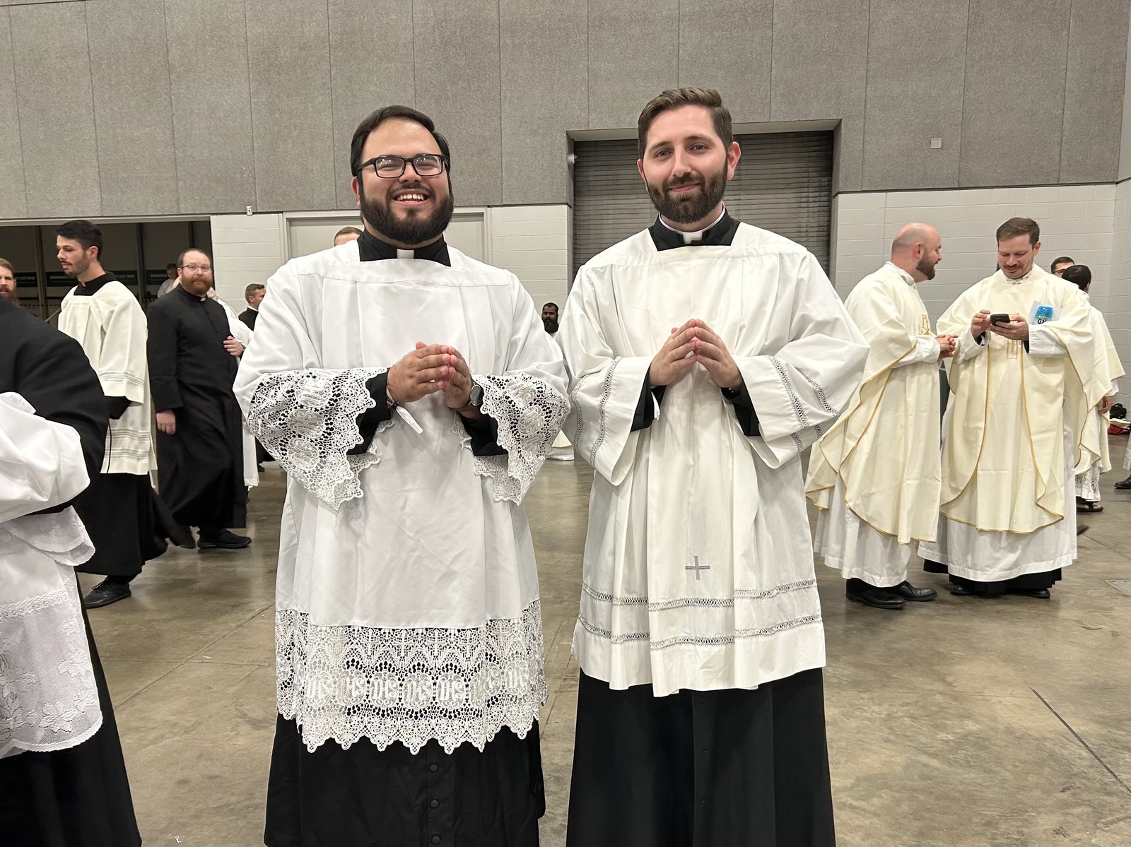 Christian Pulido, left, and Brendan Tabone, both seminarians studying for the priesthood for the Archdiocese of Detroit at Sacred Heart Major Seminary, prepare to take part in the opening procession along with more than 800 other seminarians from across the country Sept. 24 during the beatification Mass of Blessed Fulton J. Sheen at the Dome at America's Center in St. Louis.