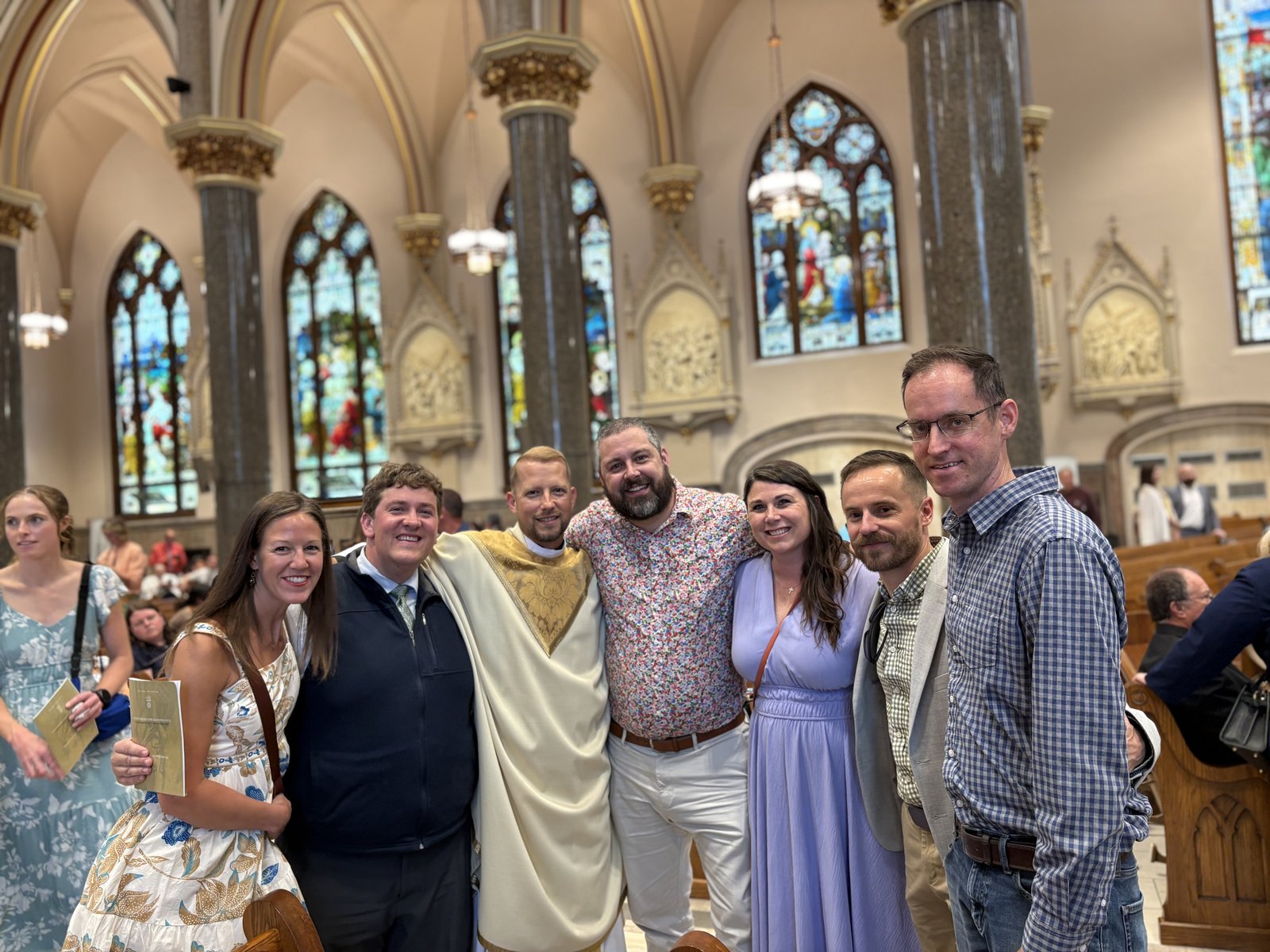 Fr. Krawetzke poses with fellow alumni from the SMCC Class of 2005 after his ordination Mass on June 13. Pictured left to right: Dana Landau, Daniel Ready, Fr. Krawetzke, Kevin Clock, Megan and Josh Hannum, and Matthew Holden. Classmate John Miller was present but not pictured. (Photo courtesy of John Ready)
