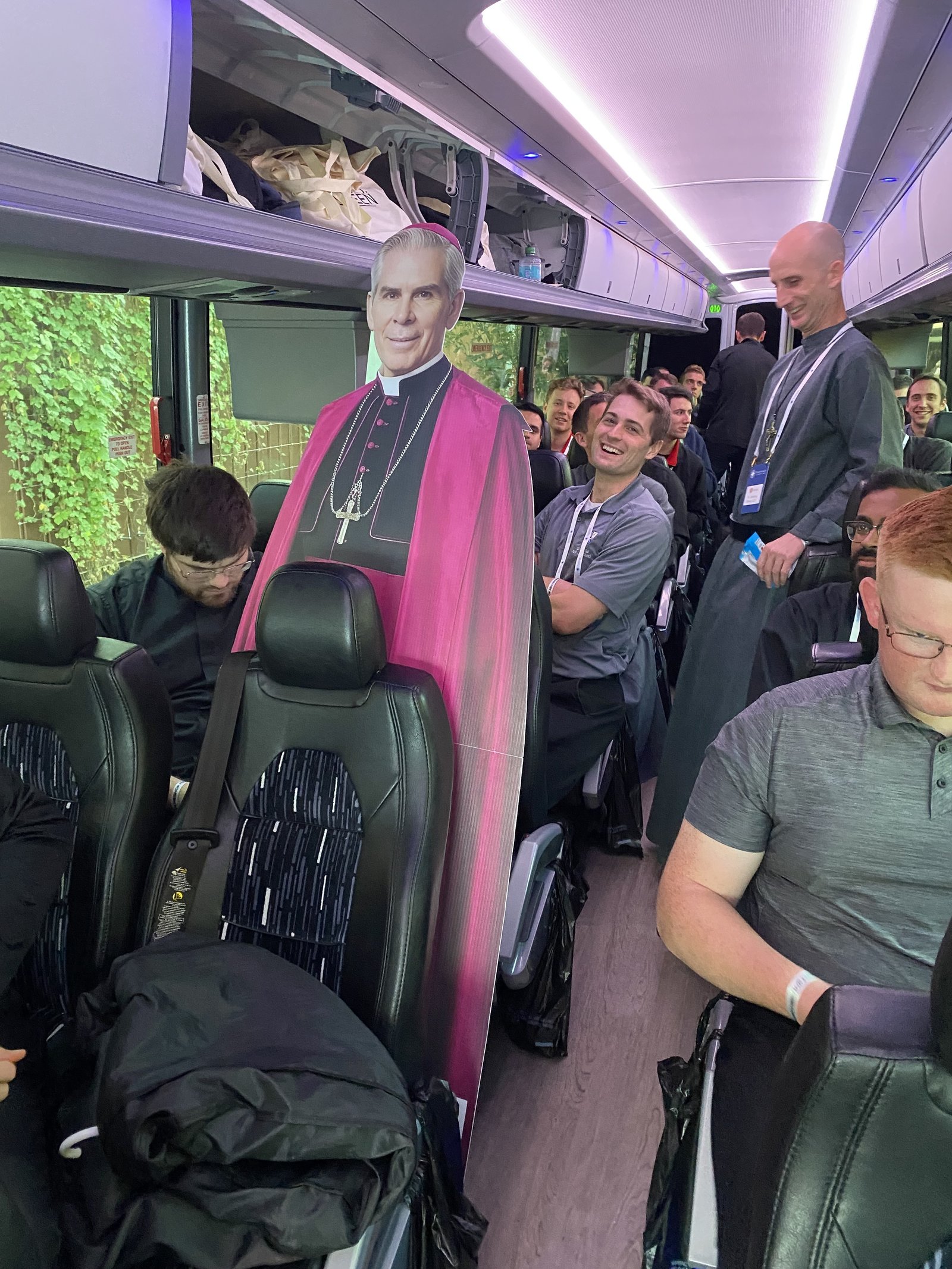 The pilgrims found room on the bus for a special "guest."