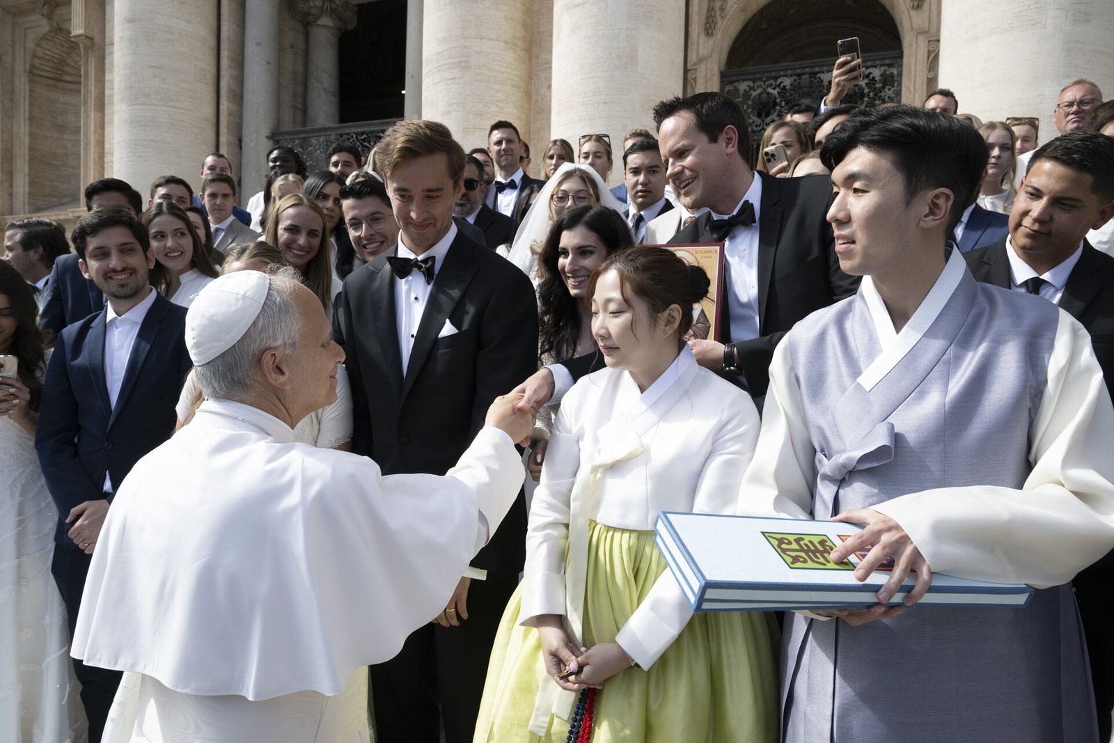 Brandon Barlog shakes hands with Pope Leo XIV after the general audience in St. Peter's Square on Oct. 1, 2025. Brandon and his bride, Gabriella, planned their wedding around going on the Sposi Novelli pilgrimage for newlyweds, initially planning on meeting Pope Francis, but blessed to greet the American pope.
