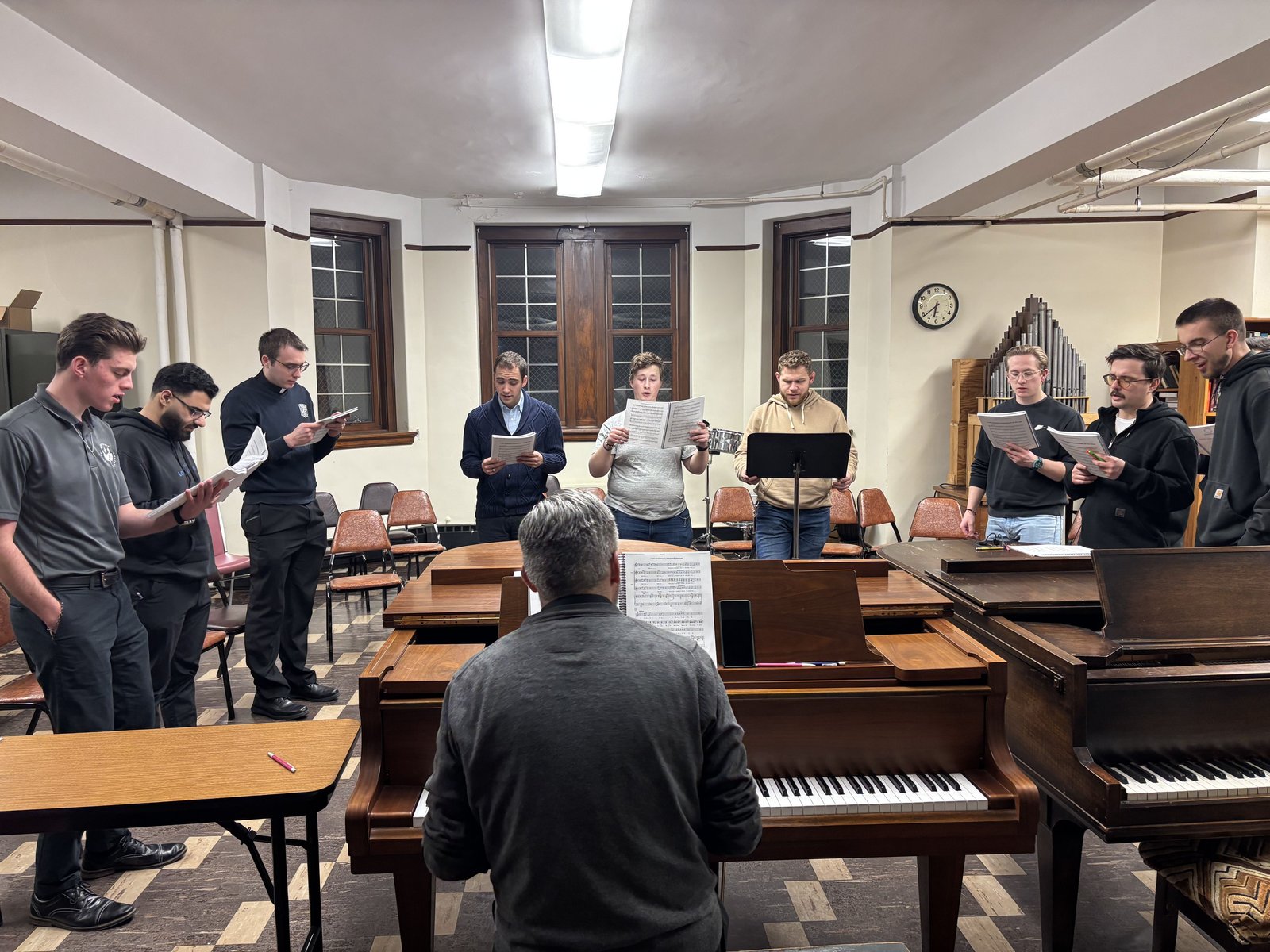 Fr. Brian Meldrum, center, assistant professor of theology and director of liturgy at the seminary, leads rehearsals Feb. 18 for the seminarians' upcoming musical performance. In 2012, the last time the seminary performed "Joseph," Fr. Meldrum was a student director and played the role of Levi.