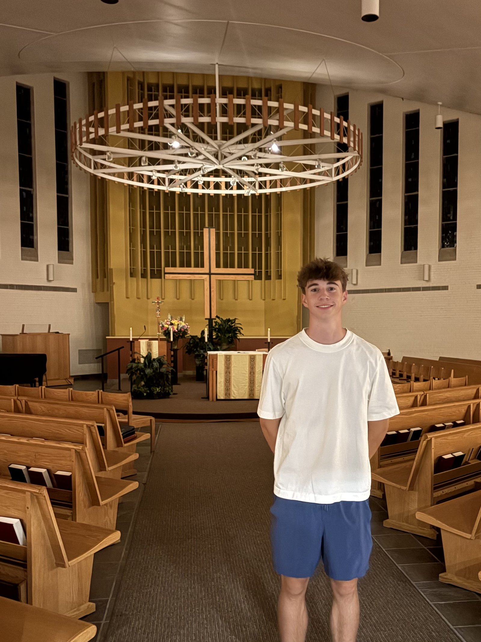 William Thibault, a 2026 graduate of Shrine Catholic High School in Royal Oak, stands in Bellarmine Chapel at Xavier University. Thibault, who was initiated into the Catholic Church in April, is a freshman at the Jesuit university located in Cincinnati, Ohio. He enjoys attending the 10 p.m. Sunday Mass at the chapel. (Photo courtesy of William Thibault)