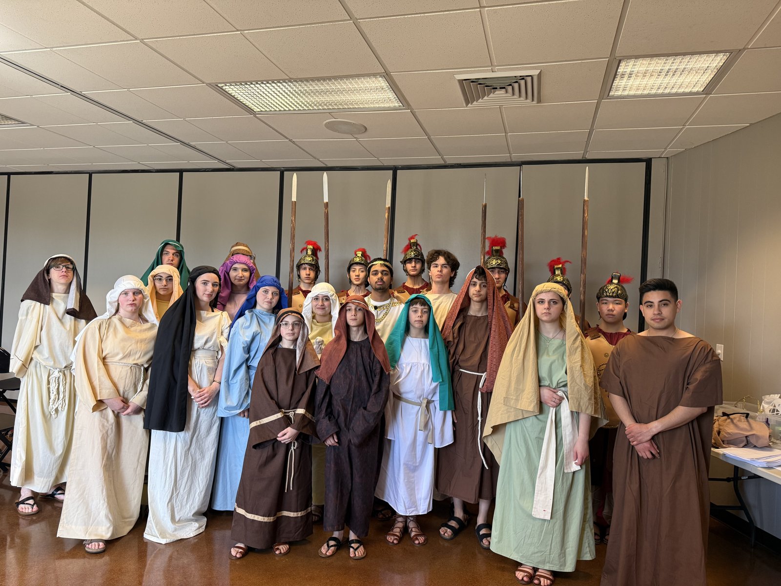The youth group at St. Irenaeus in Rochester Hills prepares and presents the Living Stations of the Cross for the parish community each year on Good Friday. (Courtesy of St. Irenaeus Parish)