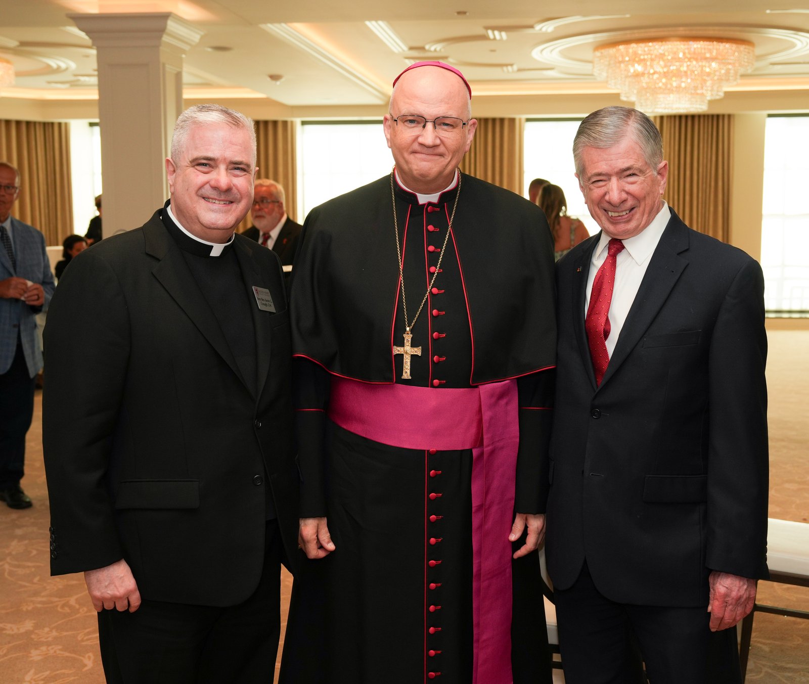 Detroit Archbishop Edward J. Weisenburger, center, is pictured with incoming Sacred Heart Major Seminary rector Fr. Kevin Creagh, CM, left, and Robert Pliska, president of SPERRY – Property Investment Counselors, at the Archbishop's Gala on June 4 at Saint John's Resort in Plymouth.