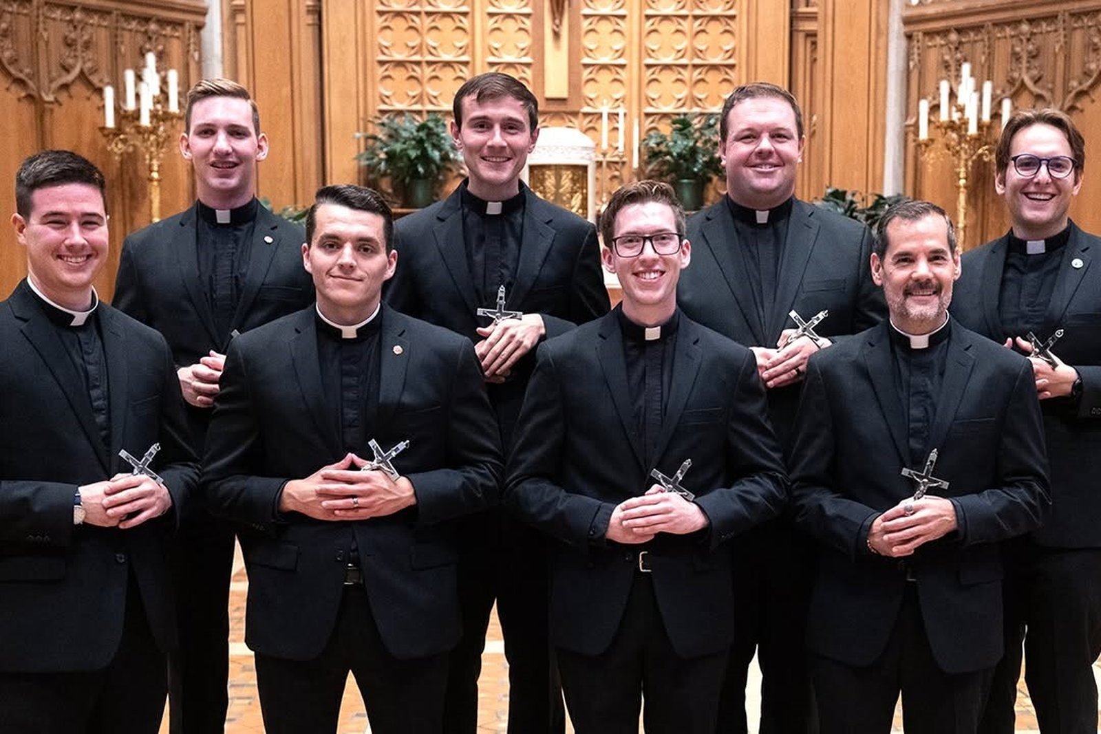 Eight Midwest Jesuits who professed first vows in August 2025 are pictured in St. Paul, Minnesota, the current site of the province's novitiate. (Courtesy of the Midwest Jesuits Facebook page)