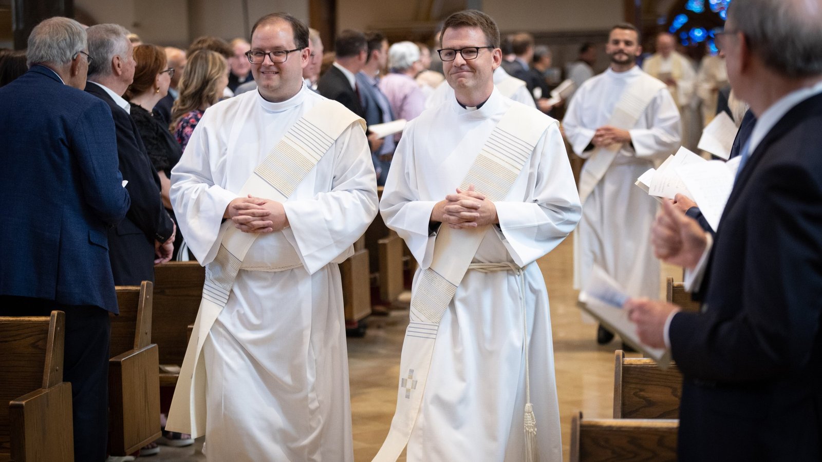 Fr. Daniel J. Dixon, SJ, right, processes next to Fr. Daniel J. Kennedy, SJ, during their ordination Mass for the Society of Jesus on June 10, 2023, at the Church of the Gesu in Milwaukee. (Courtesy of the Society of Jesus)