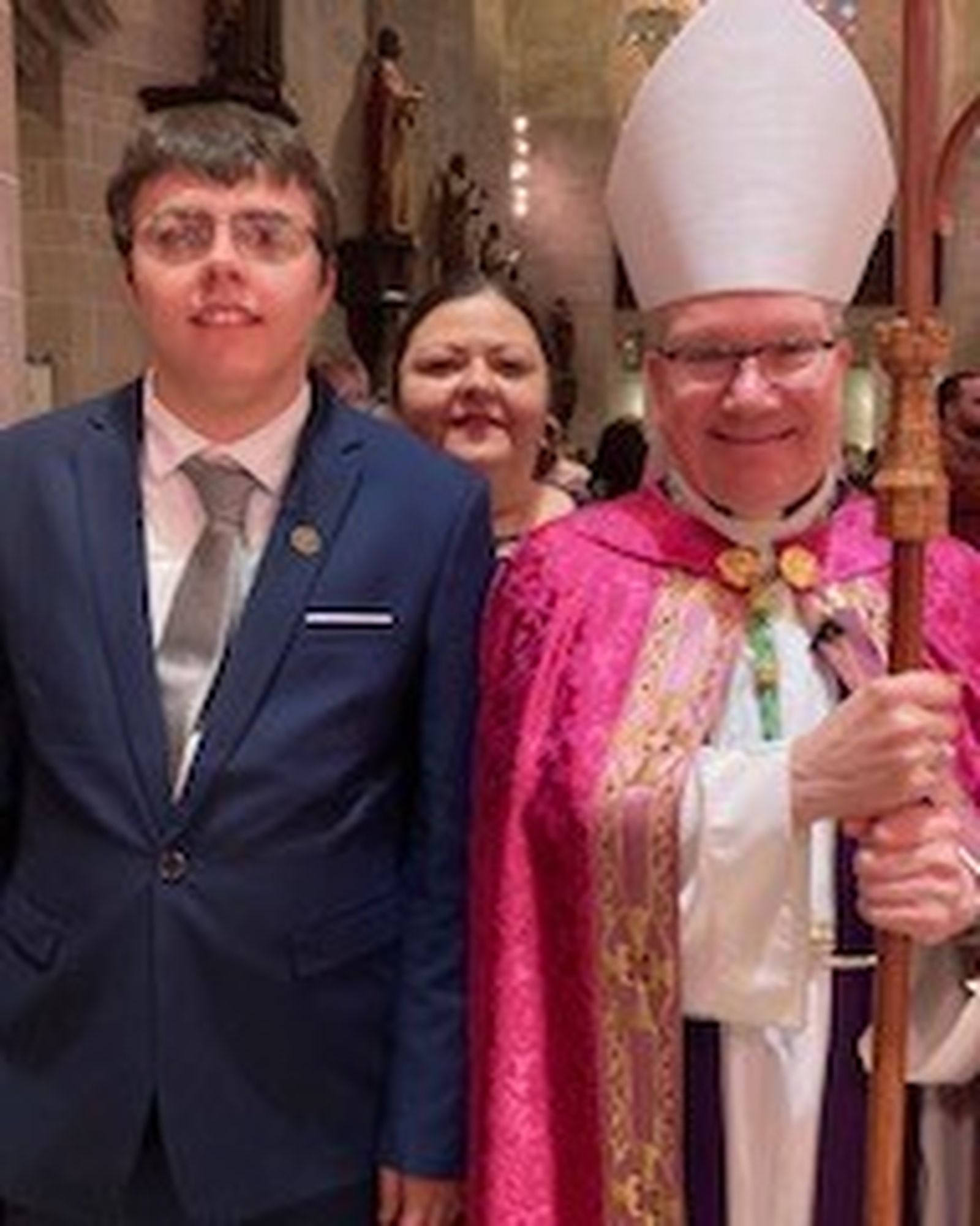 Eric and Dana Jonas are pictured with Auxiliary Bishop Jeffrey M. Monforton following the Rite of Election service this spring. Dana Jonas will be confirmed in the Catholic Church 55 years after she was baptized, while Eric will be baptized and confirmed this Easter. Both will receive their first Communions.